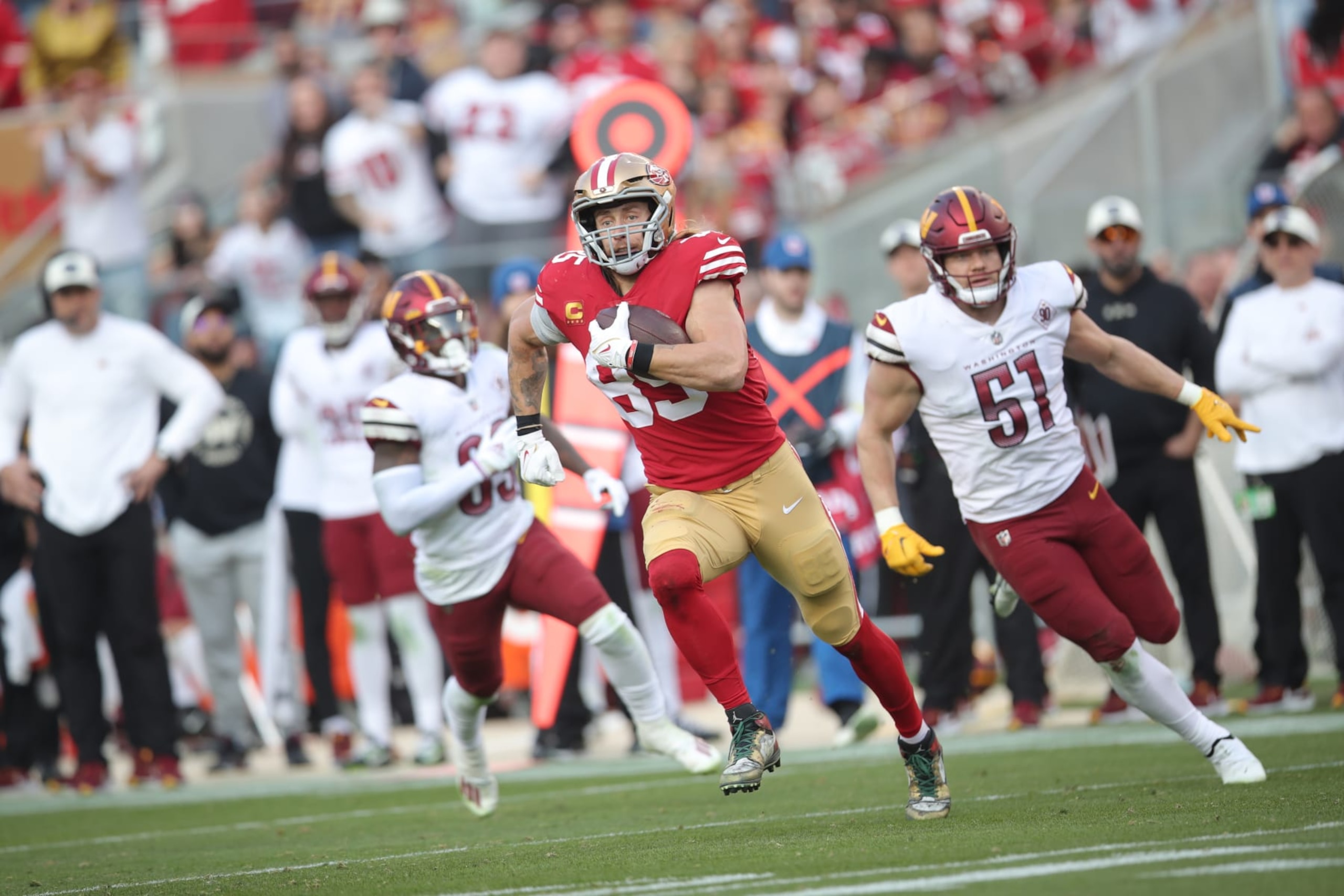 SANTA CLARA, CA - DECEMBER 24: George Kittle #85 of the San Francisco 49ers heads to the end zone on a 33-yard touchdown catch during the game against the Washington Commanders at Levi's Stadium on December 24, 2022 in Santa Clara, California. The 49ers defeated the Commanders 37-20. (Photo by Michael Zagaris/San Francisco 49ers/Getty Images)