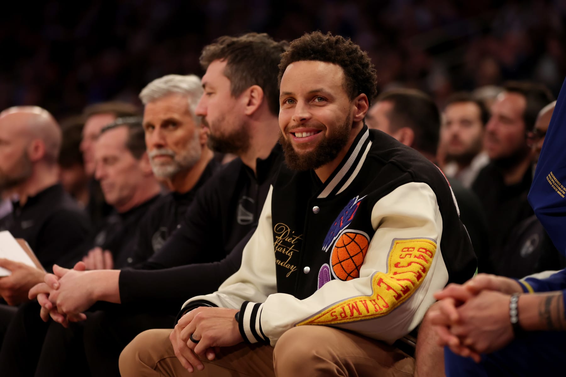 NEW YORK, NEW YORK - DECEMBER 20: Stephen Curry #30 of the Golden State Warriors looks on from the bench during the second quarter of the game against the New York Knicks at Madison Square Garden on December 20, 2022 in New York City. NOTE TO USER: User expressly acknowledges and agrees that, by downloading and/or using this photograph, User is consenting to the terms and conditions of the Getty Images License Agreement. (Photo by Sarah Stier/Getty Images)