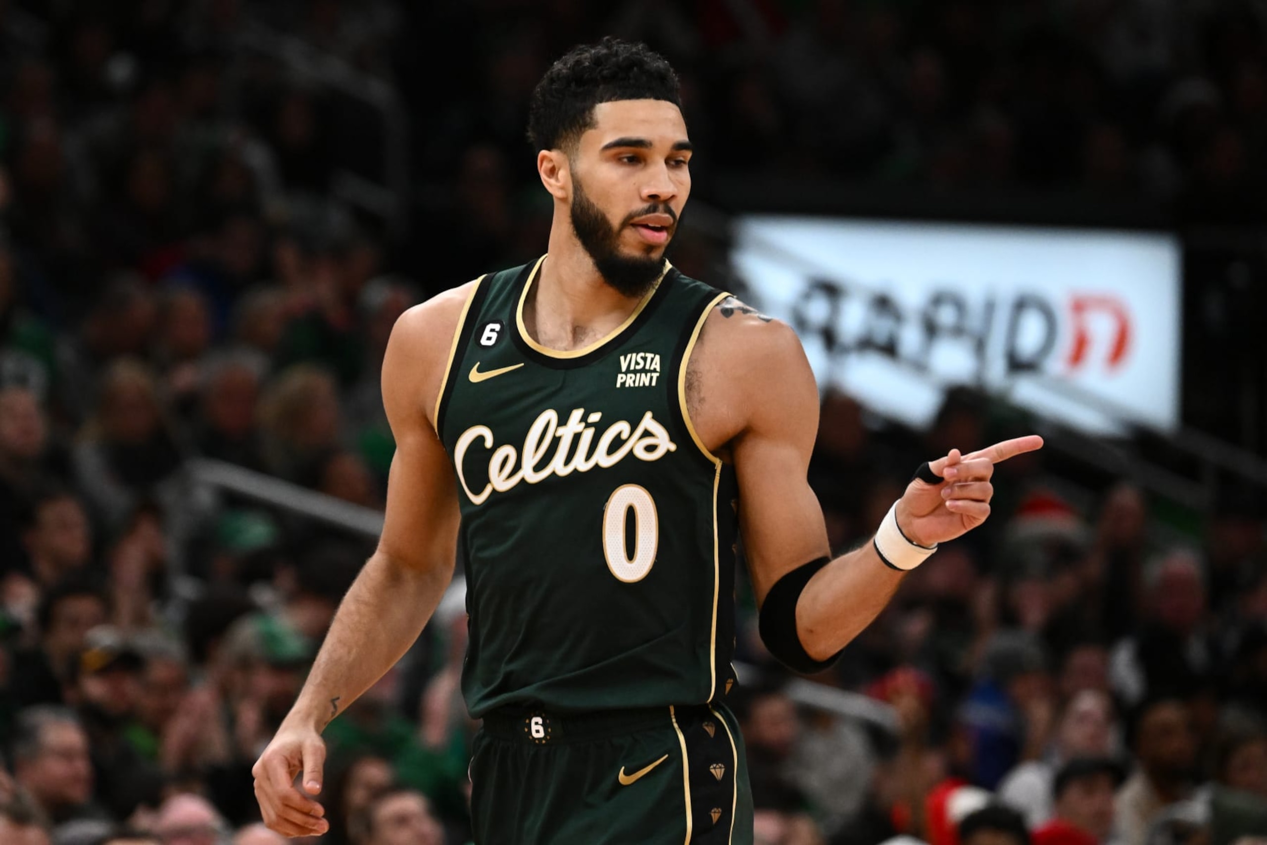 BOSTON, MASSACHUSETTS - DECEMBER 25: Jayson Tatum #0 of the Boston Celtics reacts after scoring a three-point basket against the Milwaukee Bucks during the third quarter at the TD Garden on December 25, 2022 in Boston, Massachusetts. NOTE TO USER: User expressly acknowledges and agrees that, by downloading and or using this photograph, User is consenting to the terms and conditions of the Getty Images License Agreement. (Photo by Brian Fluharty/Getty Images) BOSTON, MASSACHUSETTS - DECEMBER 25: Jayson Tatum #0 of the Boston Celtics reacts after scoring a three-point basket against the Milwaukee Bucks during the third quarter at the TD Garden on December 25, 2022 in Boston, Massachusetts. NOTE TO USER: User expressly acknowledges and agrees that, by downloading and or using this photograph, User is consenting to the terms and conditions of the Getty Images License Agreement. (Photo by Brian Fluharty/Getty Images)