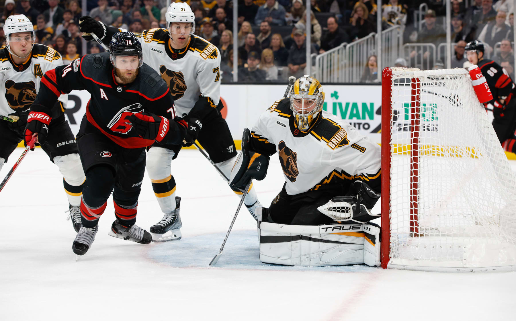 BOSTON, MA - NOVEMBER 25: Jeremy Swayman #1 of the Boston Bruins tends goal against the Carolina Hurricanes during overtime at the TD Garden on November 25, 2022 in Boston, Massachusetts. The Bruins won 3-2 in overtime and set a new NHL record for most consecutive wins at home to start a season with 12. (Photo by Richard T Gagnon/Getty Images)