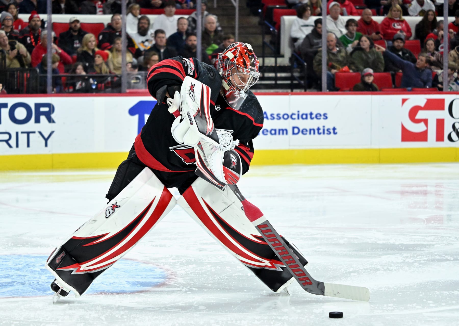 RALEIGH, NORTH CAROLINA - DECEMBER 27: Antti Raanta #32 of the Carolina Hurricanes handles the puck against the Chicago Blackhawks during the second period of their game at PNC Arena on December 27, 2022 in Raleigh, North Carolina. (Photo by Grant Halverson/Getty Images)