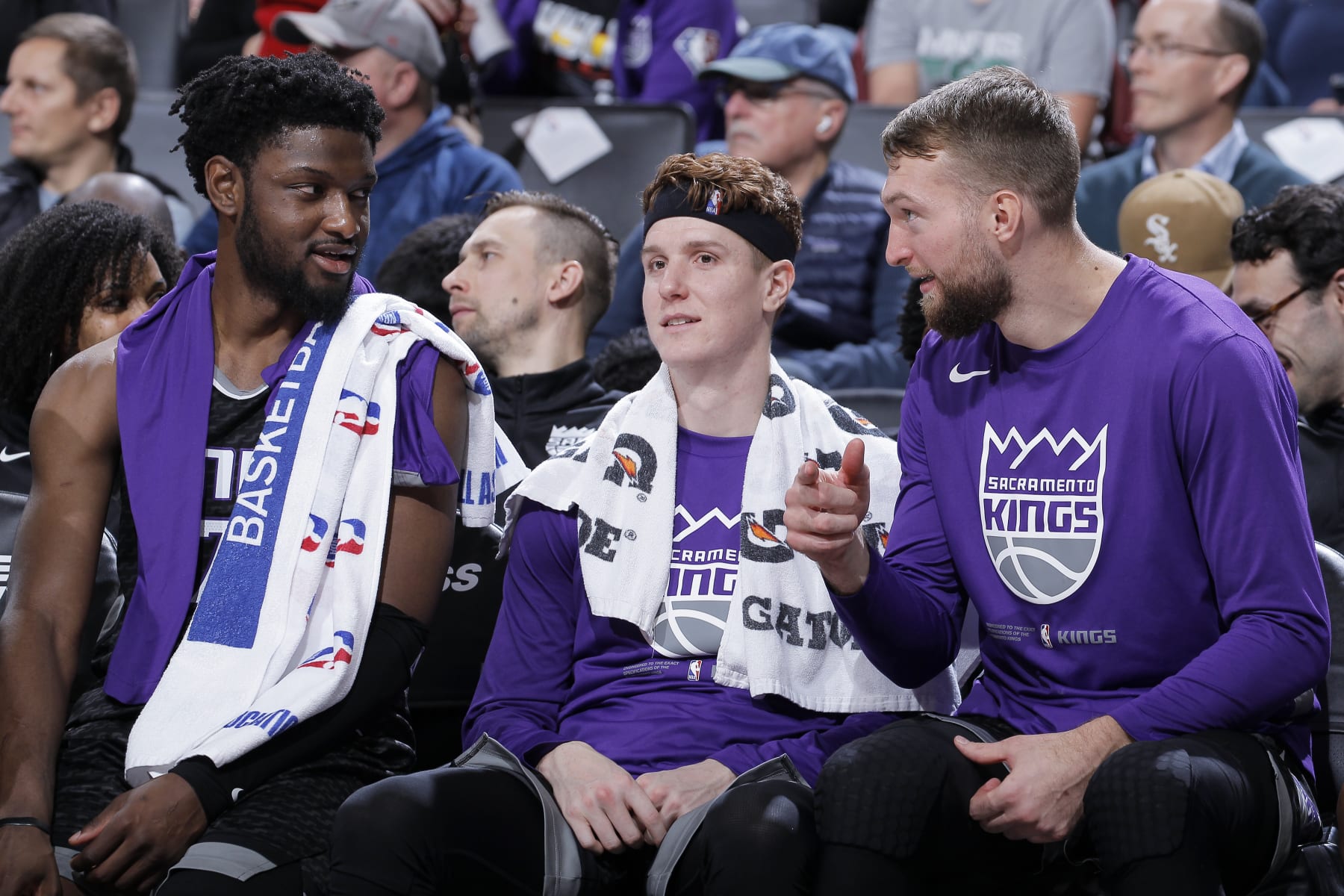 SACRAMENTO, CA - NOVEMBER 30: Chimezie Metu #7, Kevin Huerter #9, and Domantas Sabonis #10 of the Sacramento Kings talk during the game against the Indiana Pacers on November 30, 2022 at Golden 1 Center in Sacramento, California. NOTE TO USER: User expressly acknowledges and agrees that, by downloading and or using this photograph, User is consenting to the terms and conditions of the Getty Images Agreement. Mandatory Copyright Notice: Copyright 2022 NBAE (Photo by Rocky Widner/NBAE via Getty Images)