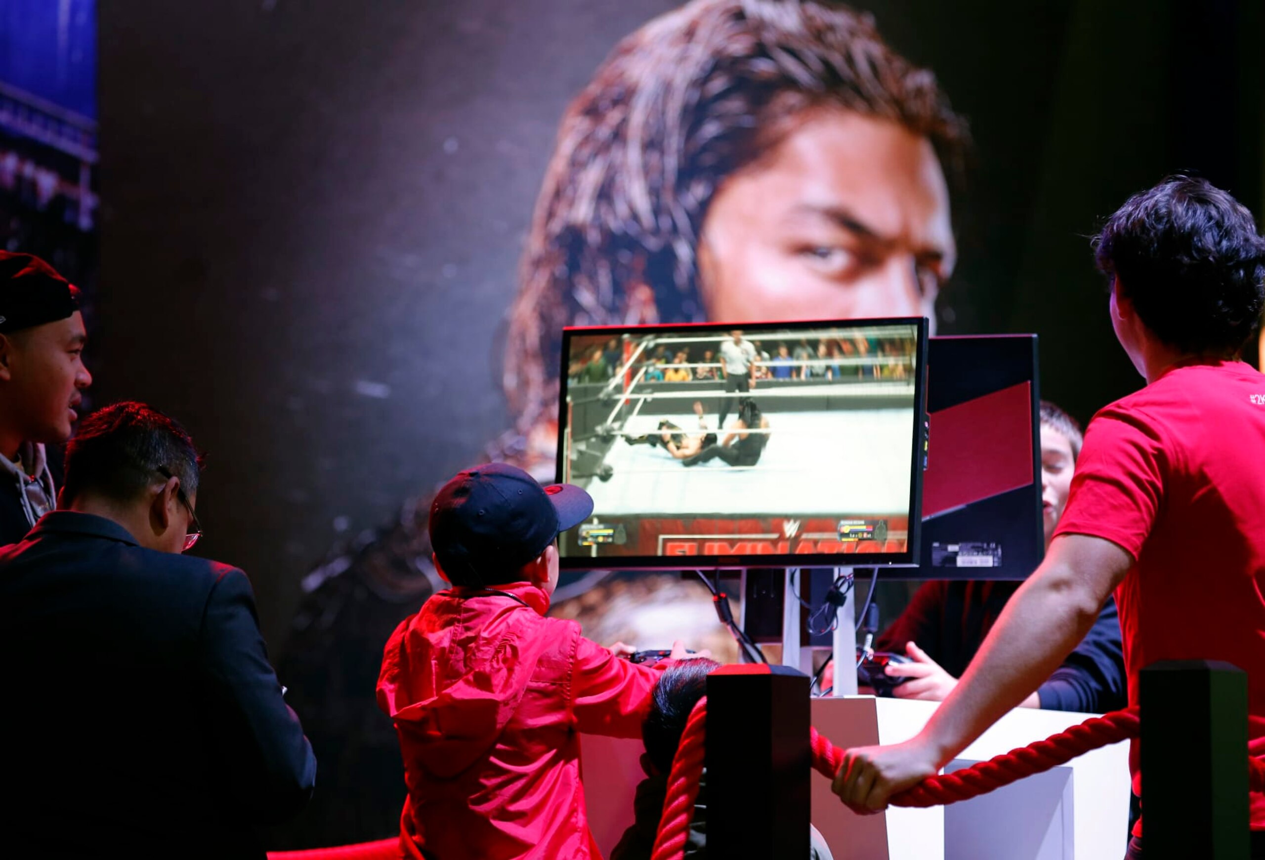 PARIS, FRANCE - OCTOBER 29: A gamer plays the video game 'WWE 2K20' developed and published by 2K Sports during the 'Paris Games Week' on October 29, 2019 in Paris, France. 'Paris Games Week' is an international trade fair for video games that runs from October 29 to November 03, 2019. (Photo by Chesnot/Getty Images)