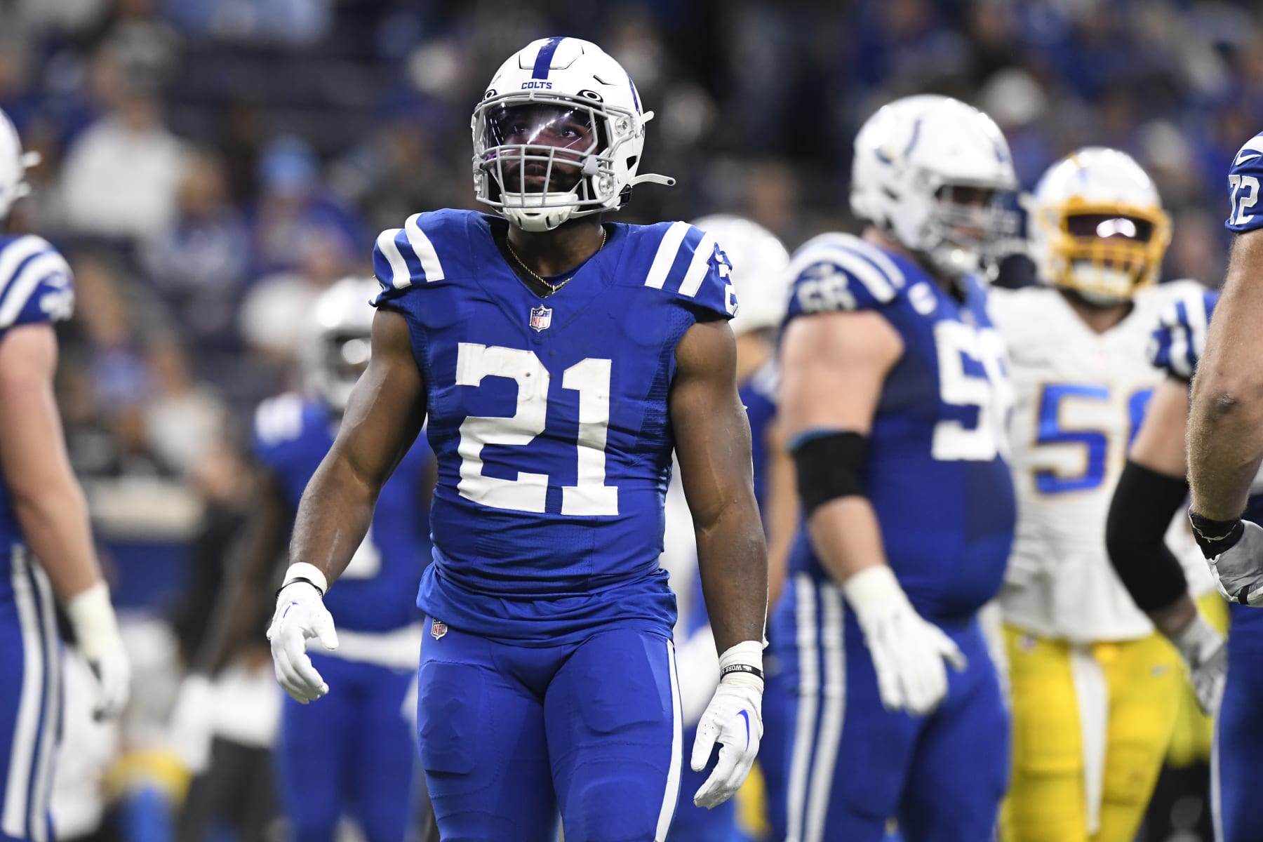 INDIANAPOLIS, IN - DECEMBER 26: Indianapolis Colts running back Zack Moss (21) looks to the sideline during the NFL football game between the Los Angeles Chargers and the Indianapolis Colts on December 26, 2022, at Lucas Oil Stadium in Indianapolis, Indiana. (Photo by Michael Allio/Icon Sportswire via Getty Images)