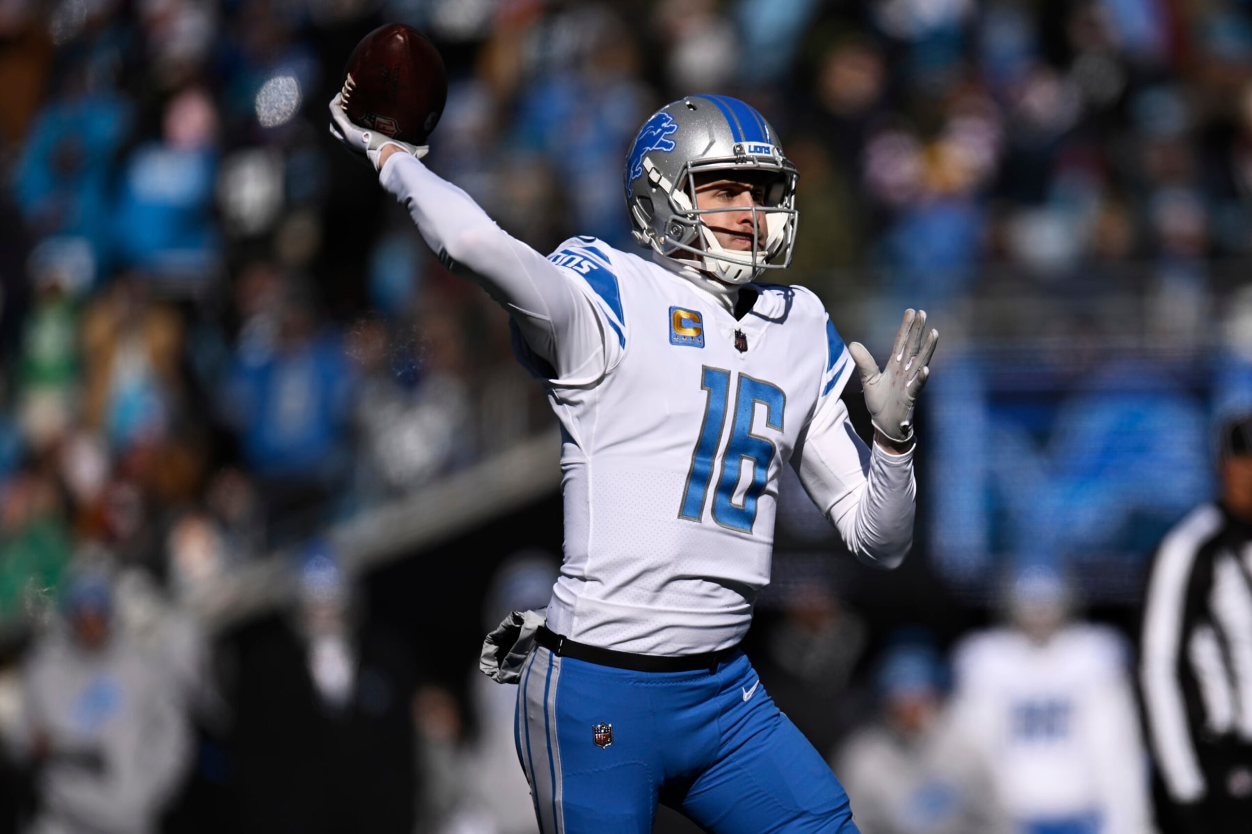 CHARLOTTE, NORTH CAROLINA - DECEMBER 24: Jared Goff #16 of the Detroit Lions throws a pass against the Carolina Panthers in the first quarter at Bank of America Stadium on December 24, 2022 in Charlotte, North Carolina. (Photo by Eakin Howard/Getty Images)