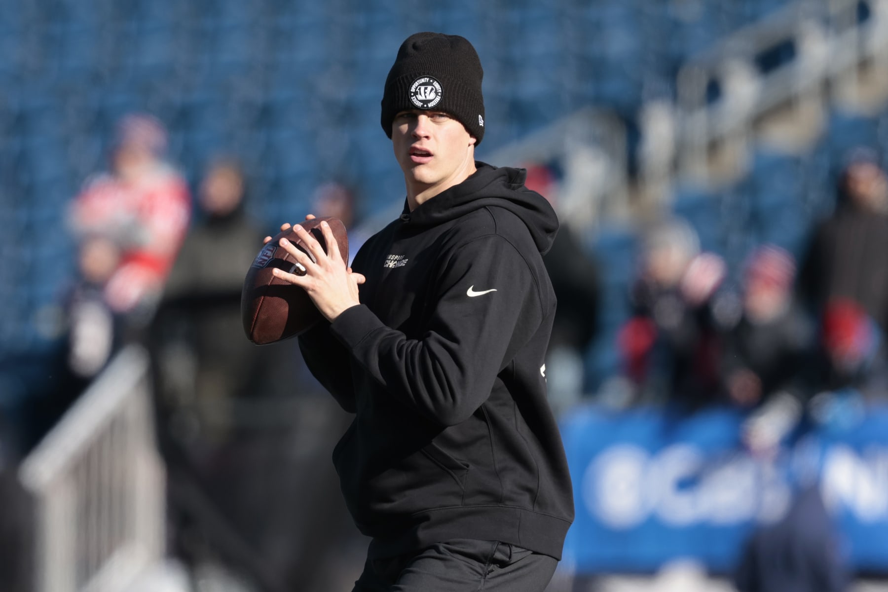 FOXBOROUGH, MASSACHUSETTS - DECEMBER 24: Joe Burrow #9 of the Cincinnati Bengals warms up against the New England Patriots at Gillette Stadium on December 24, 2022 in Foxborough, Massachusetts. (Photo by Nick Grace/Getty Images)