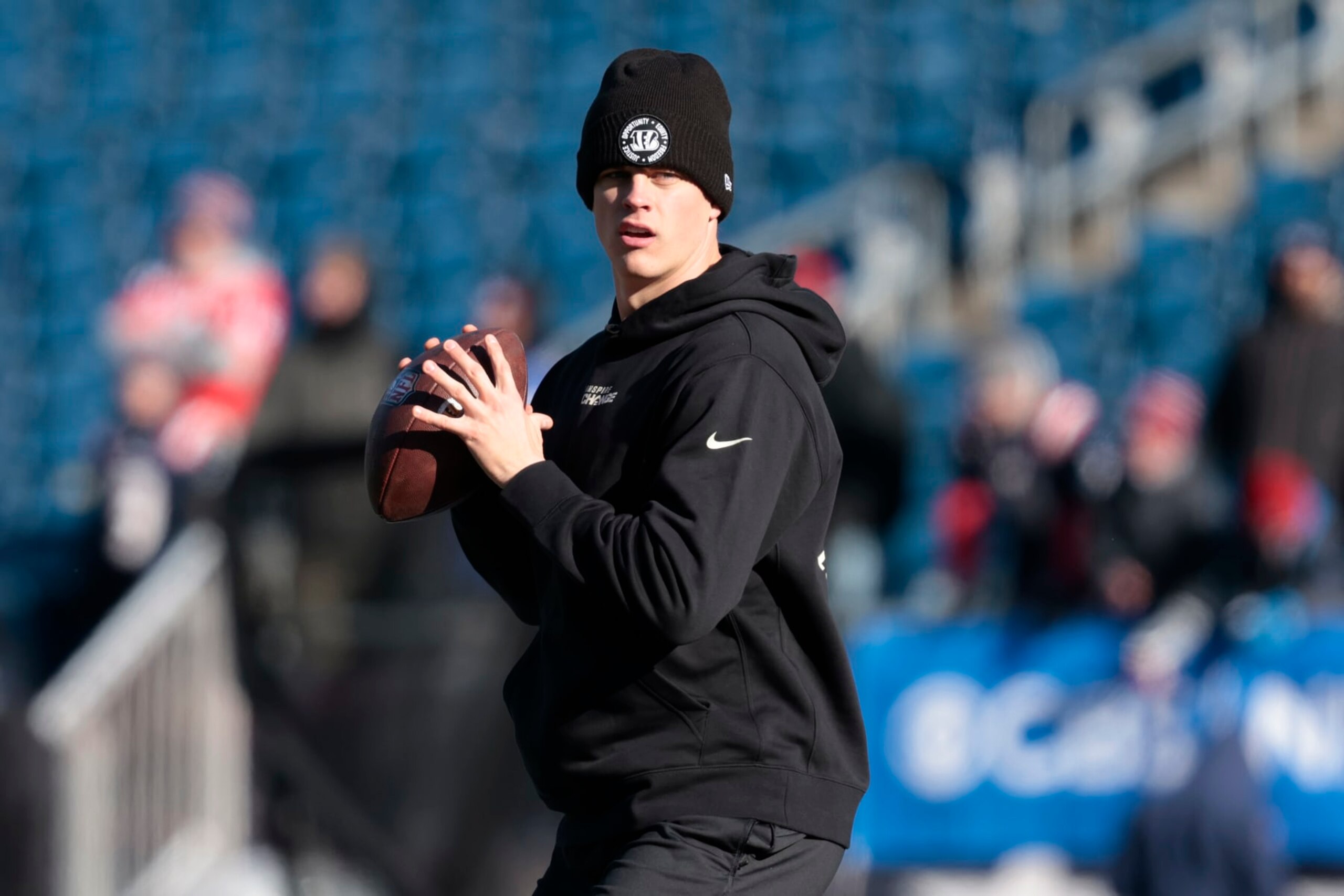 FOXBOROUGH, MASSACHUSETTS - DECEMBER 24: Joe Burrow #9 of the Cincinnati Bengals warms up against the New England Patriots at Gillette Stadium on December 24, 2022 in Foxborough, Massachusetts. (Photo by Nick Grace/Getty Images)