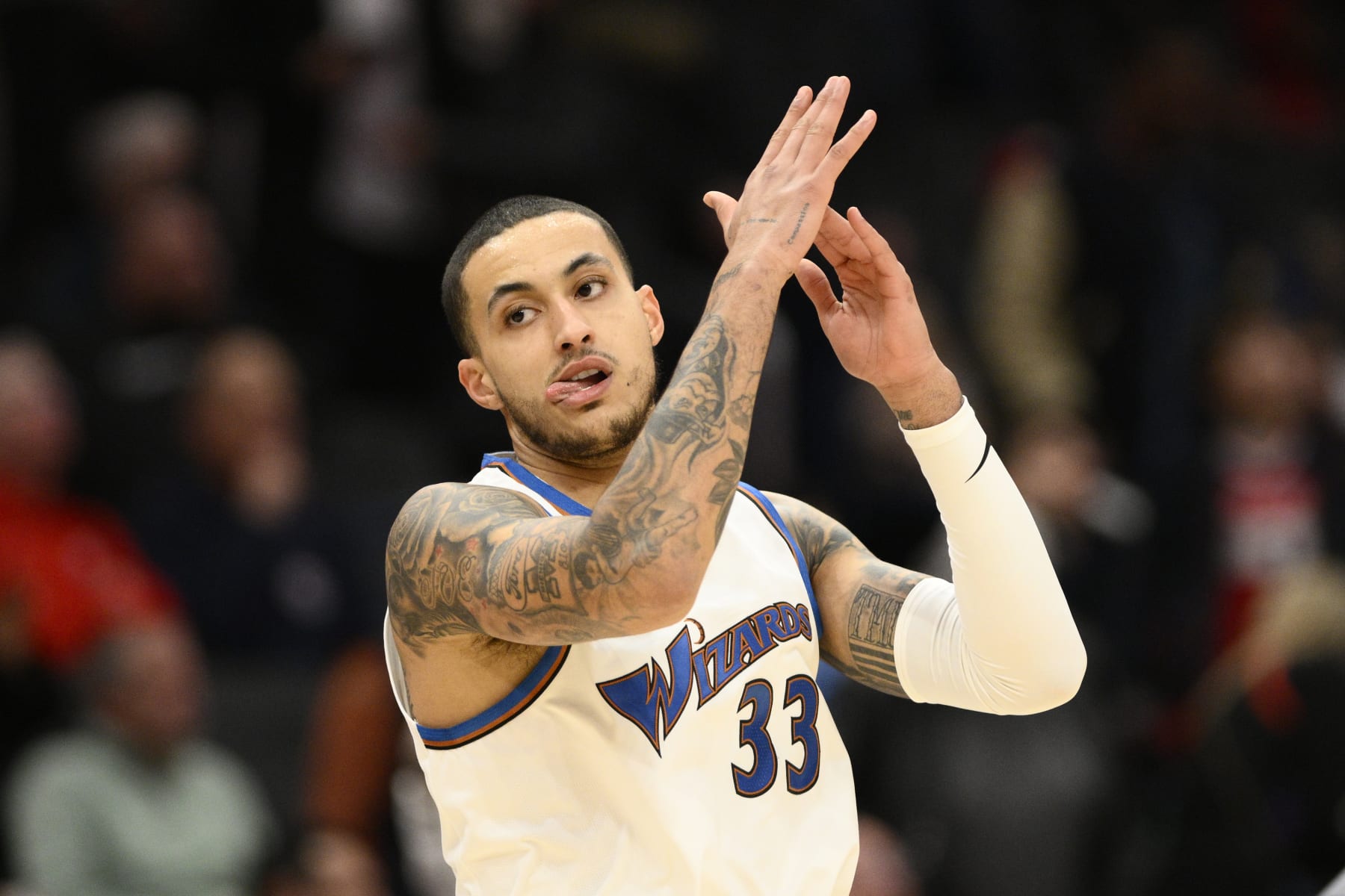 Washington Wizards forward Kyle Kuzma (33) gestures during the first half of an NBA basketball game against the Phoenix Suns, Wednesday, Dec. 28, 2022, in Washington. (AP Photo/Nick Wass)