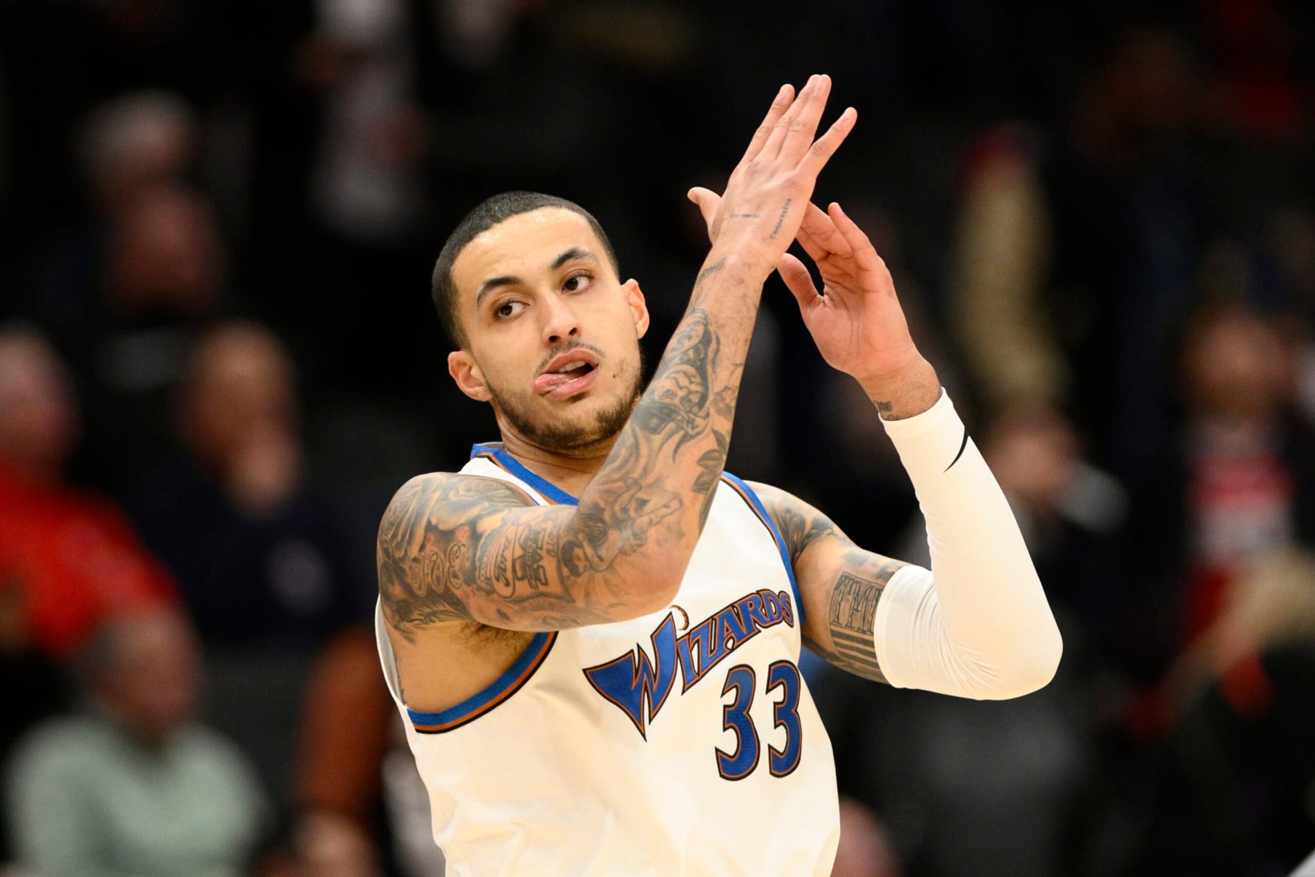 Washington Wizards forward Kyle Kuzma (33) gestures during the first half of an NBA basketball game against the Phoenix Suns, Wednesday, Dec. 28, 2022, in Washington. (AP Photo/Nick Wass)