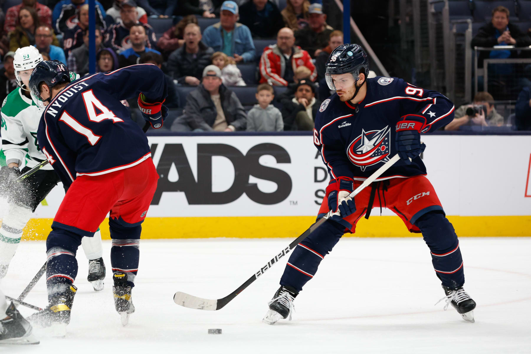 COLUMBUS, OH - DECEMBER 19: Columbus Blue Jackets center Jack Roslovic (96) with the puck in the first period in a game against the Dallas Stars on December 19, 2022, at Nationwide Arena in Columbus, Ohio. (Photo by Graham Stokes/Icon Sportswire via Getty Images)