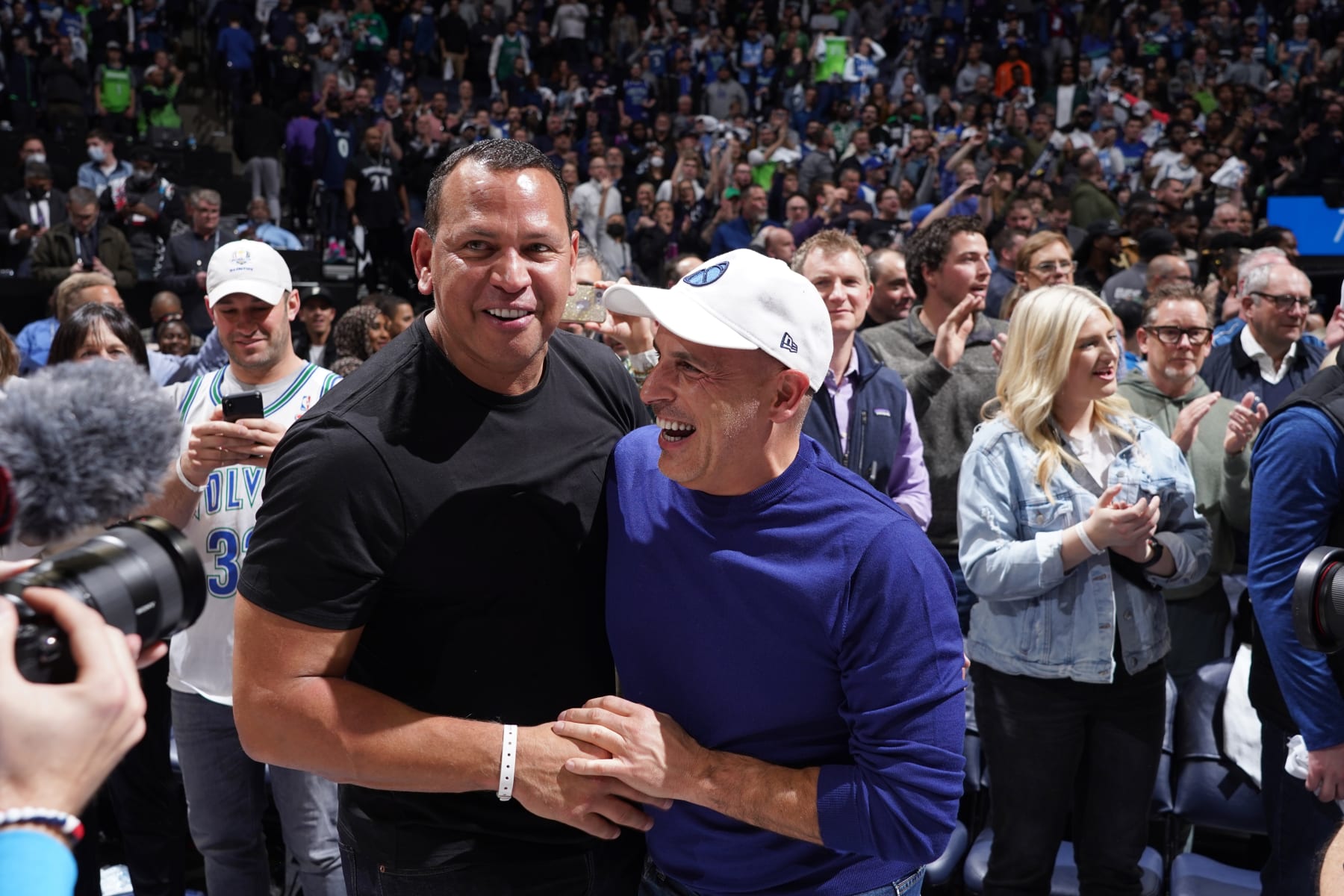 MINNEAPOLIS, MN - APRIL 12: Owners, Alex Rodriguez and Marc Lore of the Minnesota Timberwolves celebrate winning against the LA Clippers after the 2022 Play-In Tournament on April 12, 2022 at Target Center in Minneapolis, Minnesota. NOTE TO USER: User expressly acknowledges and agrees that, by downloading and or using this Photograph, user is consenting to the terms and conditions of the Getty Images License Agreement. Mandatory Copyright Notice: Copyright 2022 NBAE (Photo by Jordan Johnson/NBAE via Getty Images)