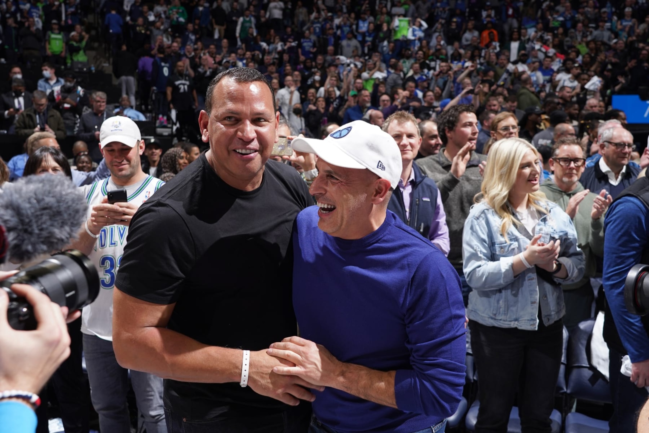 MINNEAPOLIS, MN - APRIL 12: Owners, Alex Rodriguez and Marc Lore of the Minnesota Timberwolves celebrate winning against the LA Clippers after the 2022 Play-In Tournament on April 12, 2022 at Target Center in Minneapolis, Minnesota. NOTE TO USER: User expressly acknowledges and agrees that, by downloading and or using this Photograph, user is consenting to the terms and conditions of the Getty Images License Agreement. Mandatory Copyright Notice: Copyright 2022 NBAE (Photo by Jordan Johnson/NBAE via Getty Images)