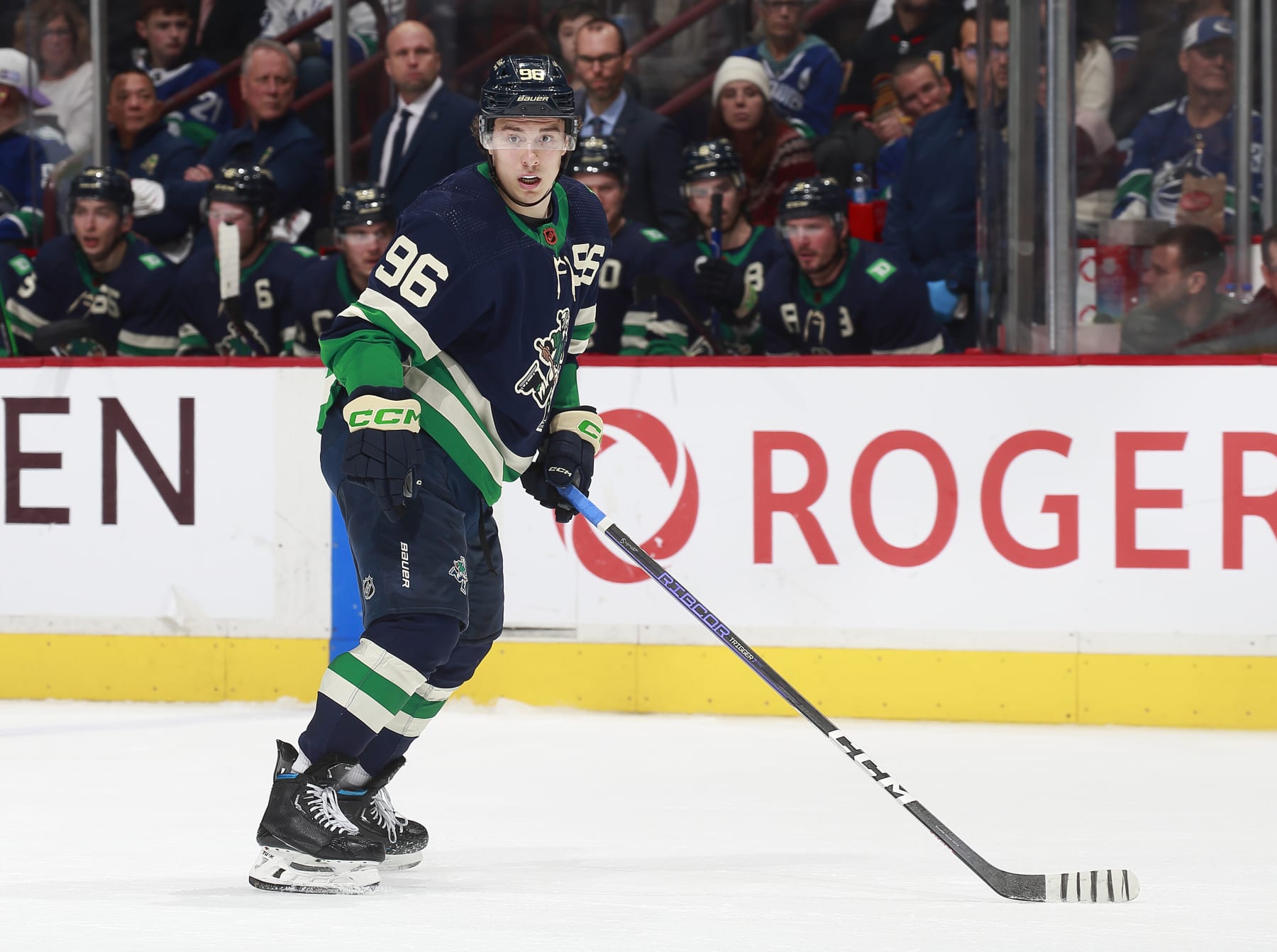 VANCOUVER, CANADA - DECEMBER 27: Andrei Kuzmenko #96 of the Vancouver Canucks skates up ice during their NHL game against the San Jose Sharks at Rogers Arena December 27, 2022 in Vancouver, British Columbia, Canada.  (Photo by Jeff Vinnick/NHLI via Getty Images)