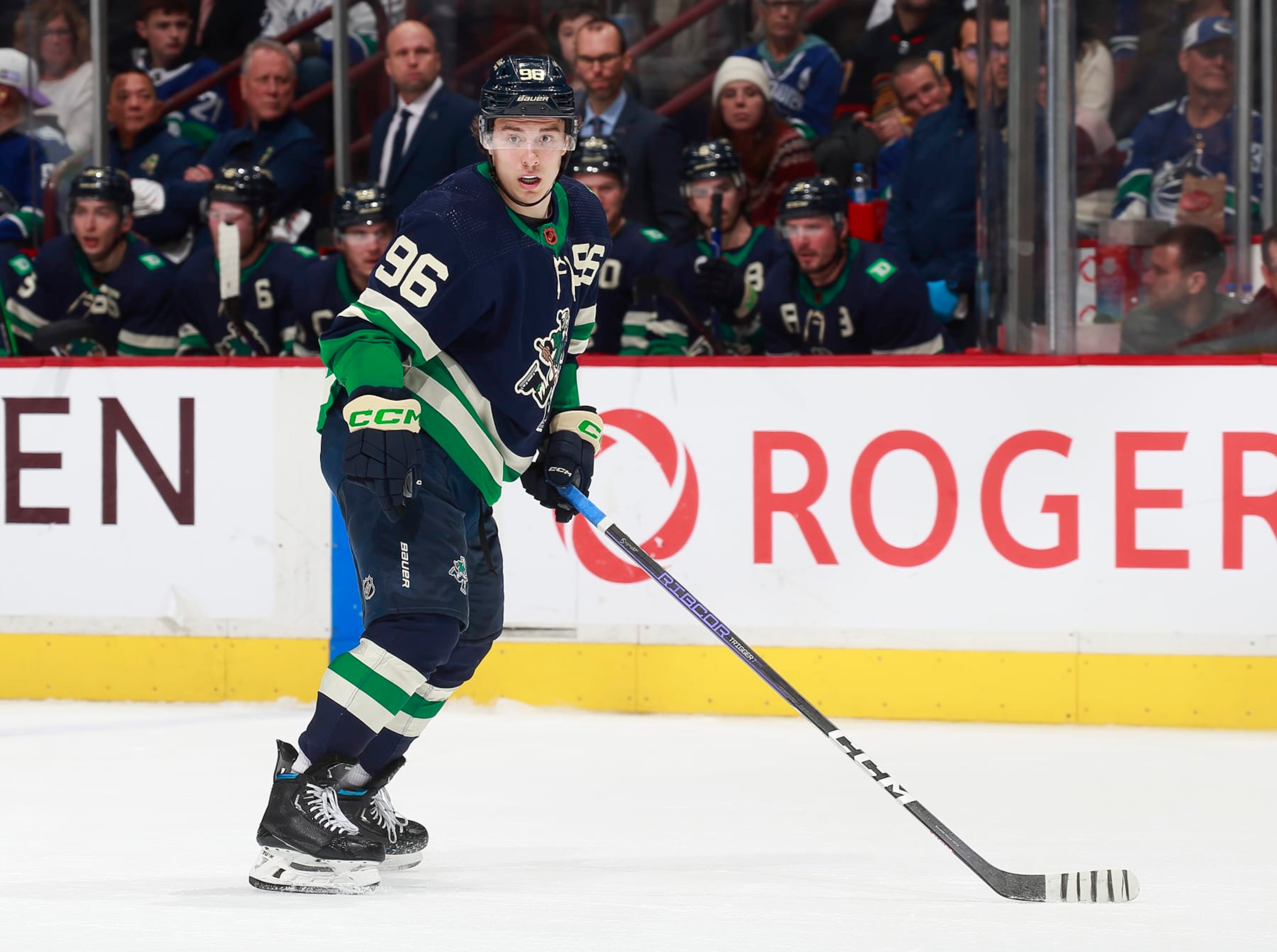 VANCOUVER, CANADA - DECEMBER 27: Andrei Kuzmenko #96 of the Vancouver Canucks skates up ice during their NHL game against the San Jose Sharks at Rogers Arena December 27, 2022 in Vancouver, British Columbia, Canada.  (Photo by Jeff Vinnick/NHLI via Getty Images)