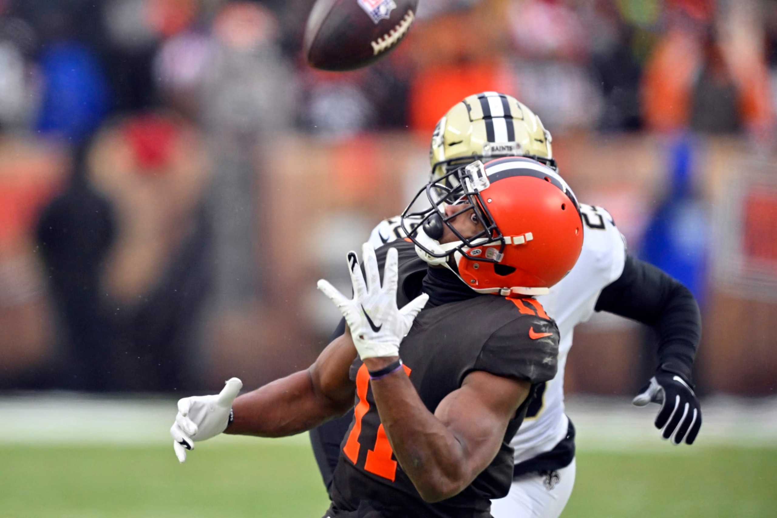 Cleveland Browns wide receiver Donovan Peoples-Jones (11) reaches but is unable to catch the overthrown pass during the second half of an NFL football game against the New Orleans Saints, Saturday, Dec. 24, 2022, in Cleveland. (AP Photo/David Richard)