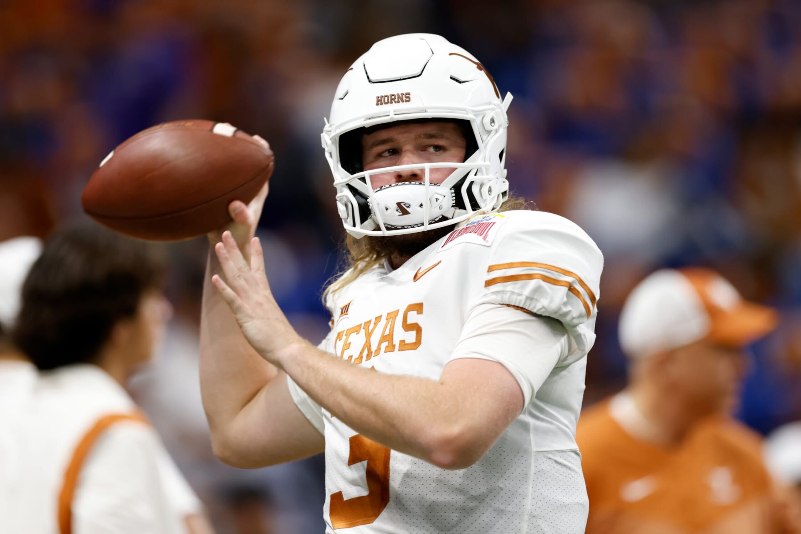 SAN ANTONIO, TEXAS - DECEMBER 29: Quinn Ewers #3 of the Texas Longhorns warms up before the Valero Alamo Bowl against the Washington Huskies at Alamodome on December 29, 2022 in San Antonio, Texas. (Photo by Tim Warner/Getty Images)