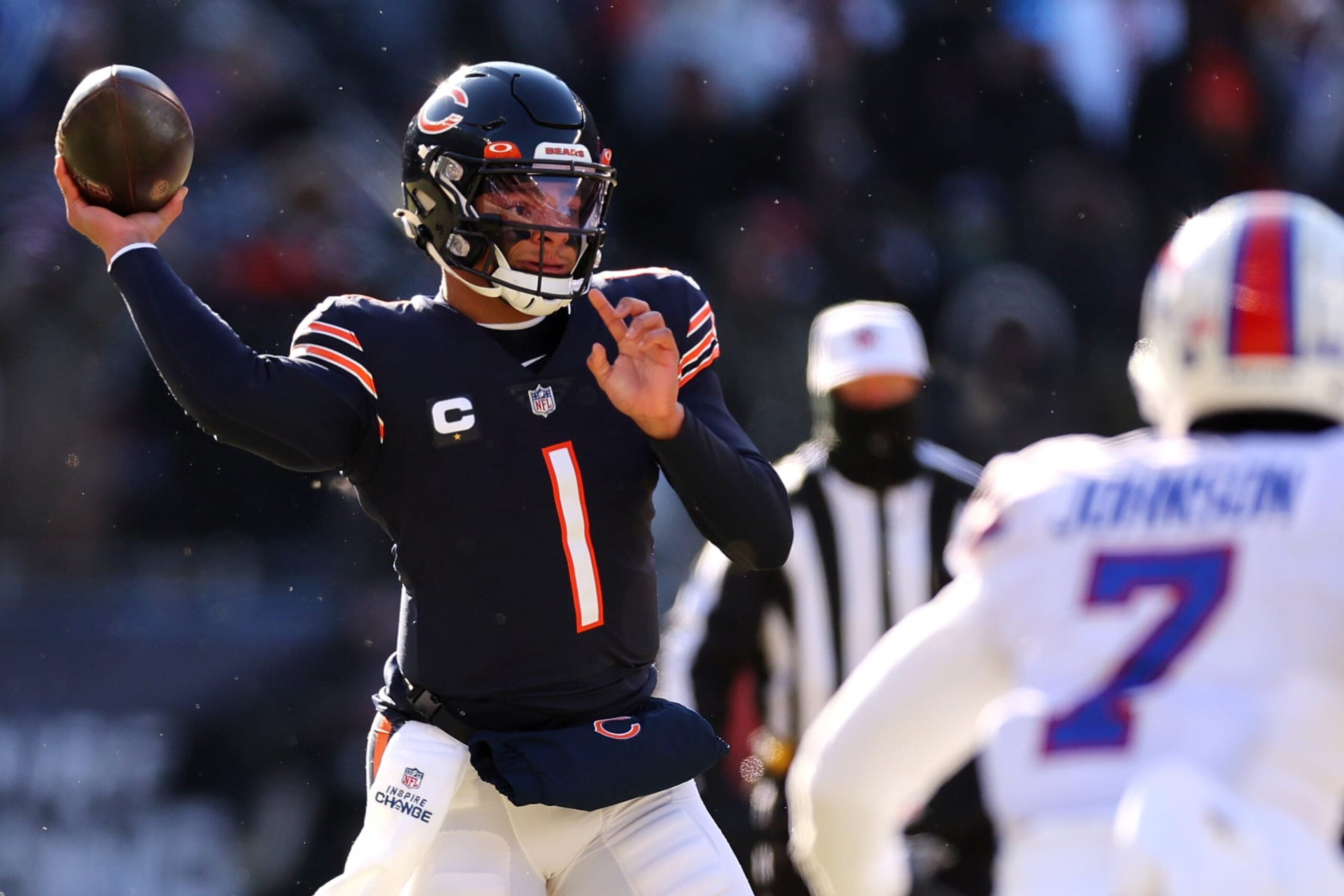 CHICAGO, ILLINOIS - DECEMBER 24: Justin Fields #1 of the Chicago Bears throws a pass against the Buffalo Bills at Soldier Field on December 24, 2022 in Chicago, Illinois. (Photo by Michael Reaves/Getty Images)