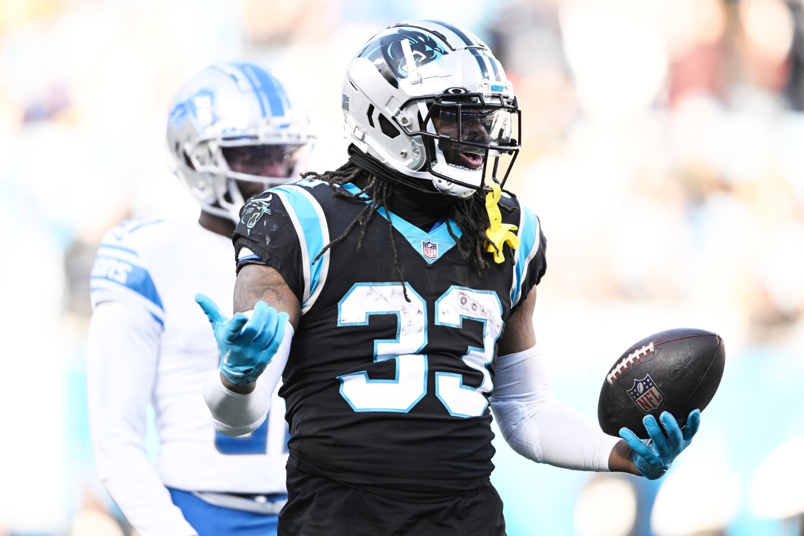 CHARLOTTE, NORTH CAROLINA - DECEMBER 24: D'Onta Foreman #33 of the Carolina Panthers reacts during their game against the Detroit Lions in the third quarter at Bank of America Stadium on December 24, 2022 in Charlotte, North Carolina. (Photo by Eakin Howard/Getty Images)