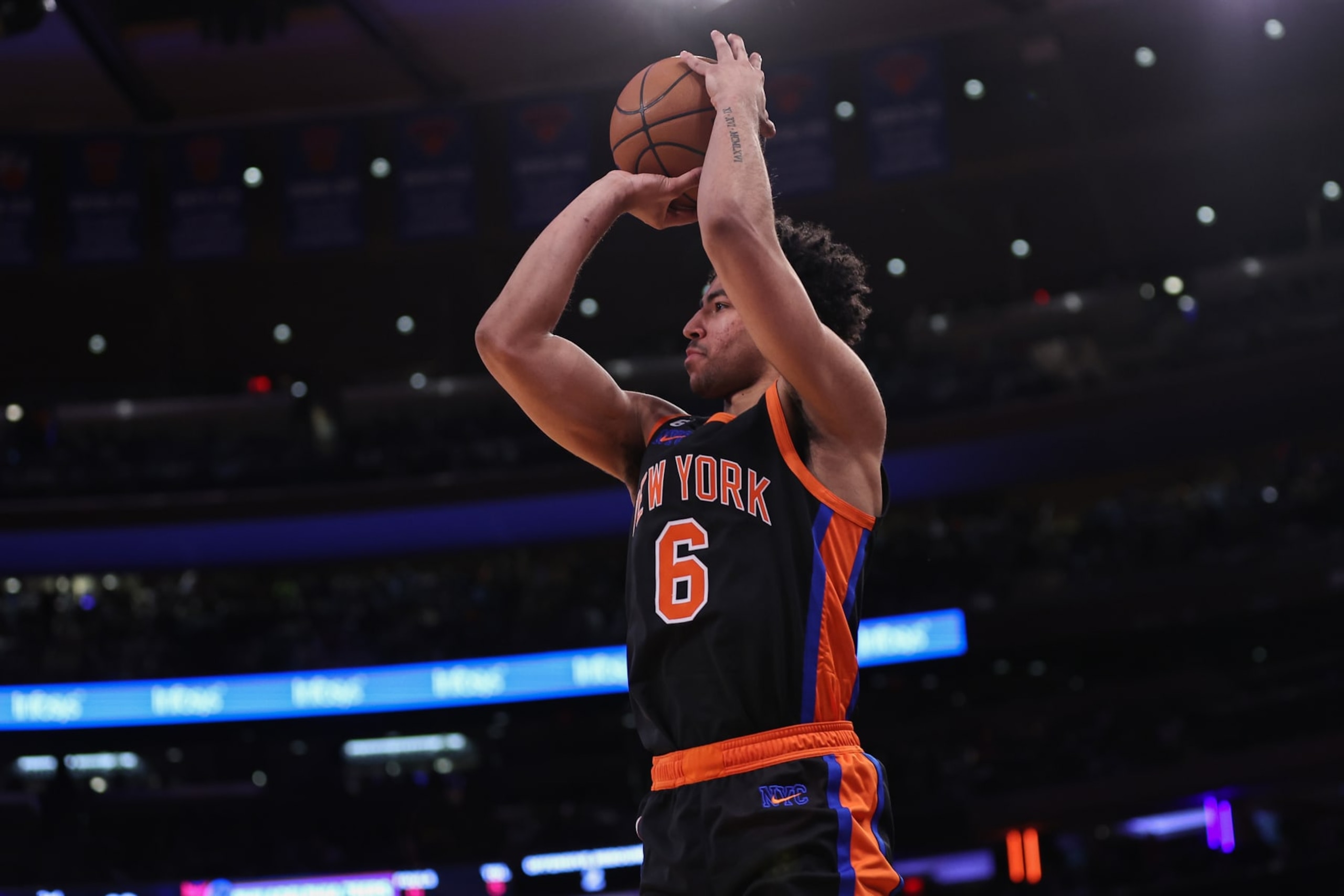 NEW YORK, NEW YORK - DECEMBER 25: Quentin Grimes #6 of the New York Knicks shoots a jump shot during the third quarter of the game against the Philadelphia 76ers at Madison Square Garden on December 25, 2022 in New York City.  NOTE TO USER: User expressly acknowledges and agrees that, by downloading and or using this photograph, User is consenting to the terms and conditions of the Getty Images License Agreement. (Photo by Dustin Satloff/Getty Images)