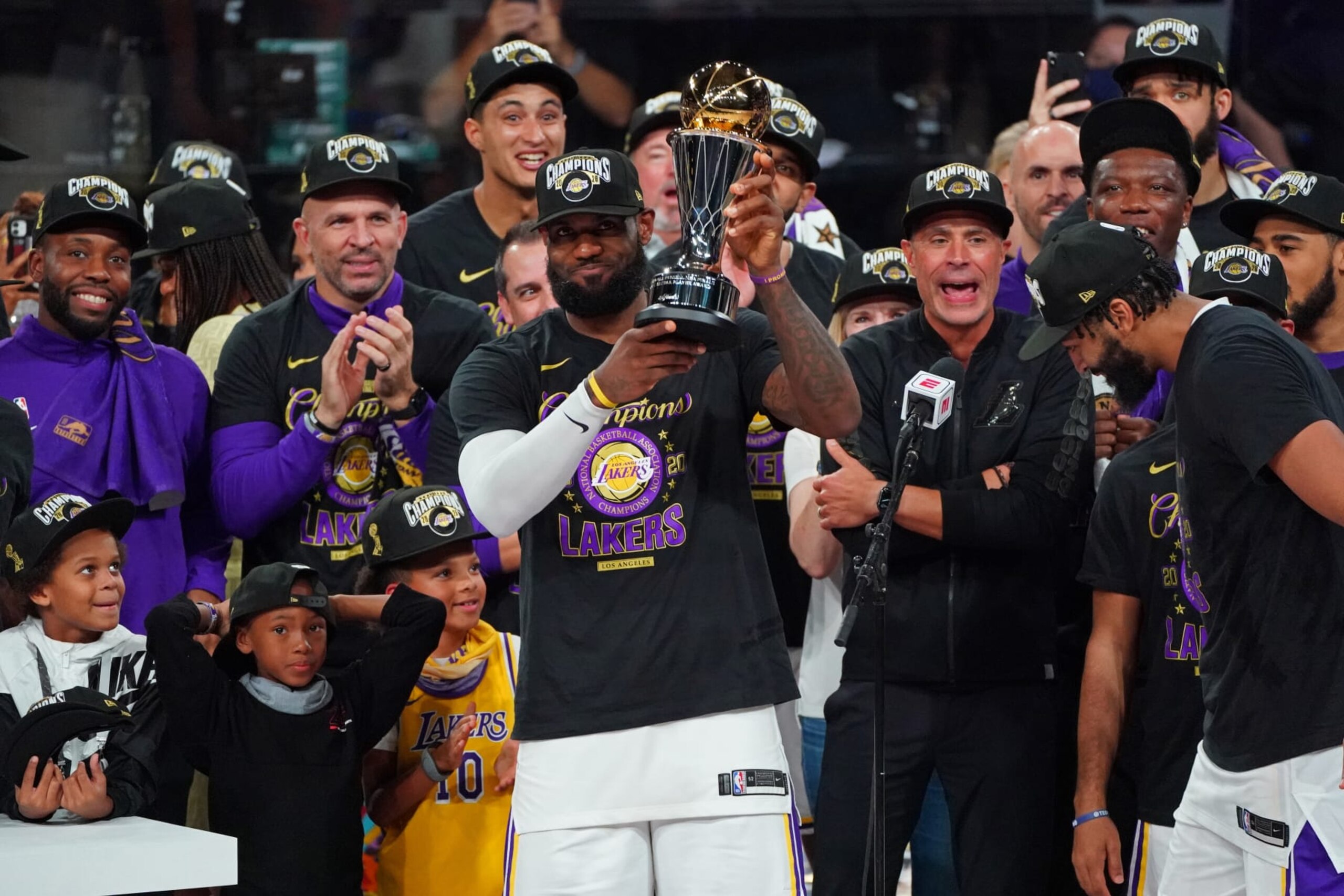 ORLANDO, FL - OCTOBER 11: LeBron James #23 of the Los Angeles Lakers receives the Bill Russell NBA Finals MVP award following Game Six of the NBA Finals on October 11, 2020 in Orlando, Florida at AdventHealth Arena. NOTE TO USER: User expressly acknowledges and agrees that, by downloading and/or using this Photograph, user is consenting to the terms and conditions of the Getty Images License Agreement. Mandatory Copyright Notice: Copyright 2020 NBAE (Photo by Jesse D. Garrabrant/NBAE via Getty Images) ORLANDO, FL - OCTOBER 11: LeBron James #23 of the Los Angeles Lakers receives the Bill Russell NBA Finals MVP award following Game Six of the NBA Finals on October 11, 2020 in Orlando, Florida at AdventHealth Arena. NOTE TO USER: User expressly acknowledges and agrees that, by downloading and/or using this Photograph, user is consenting to the terms and conditions of the Getty Images License Agreement. Mandatory Copyright Notice: Copyright 2020 NBAE (Photo by Jesse D. Garrabrant/NBAE via Getty Images)