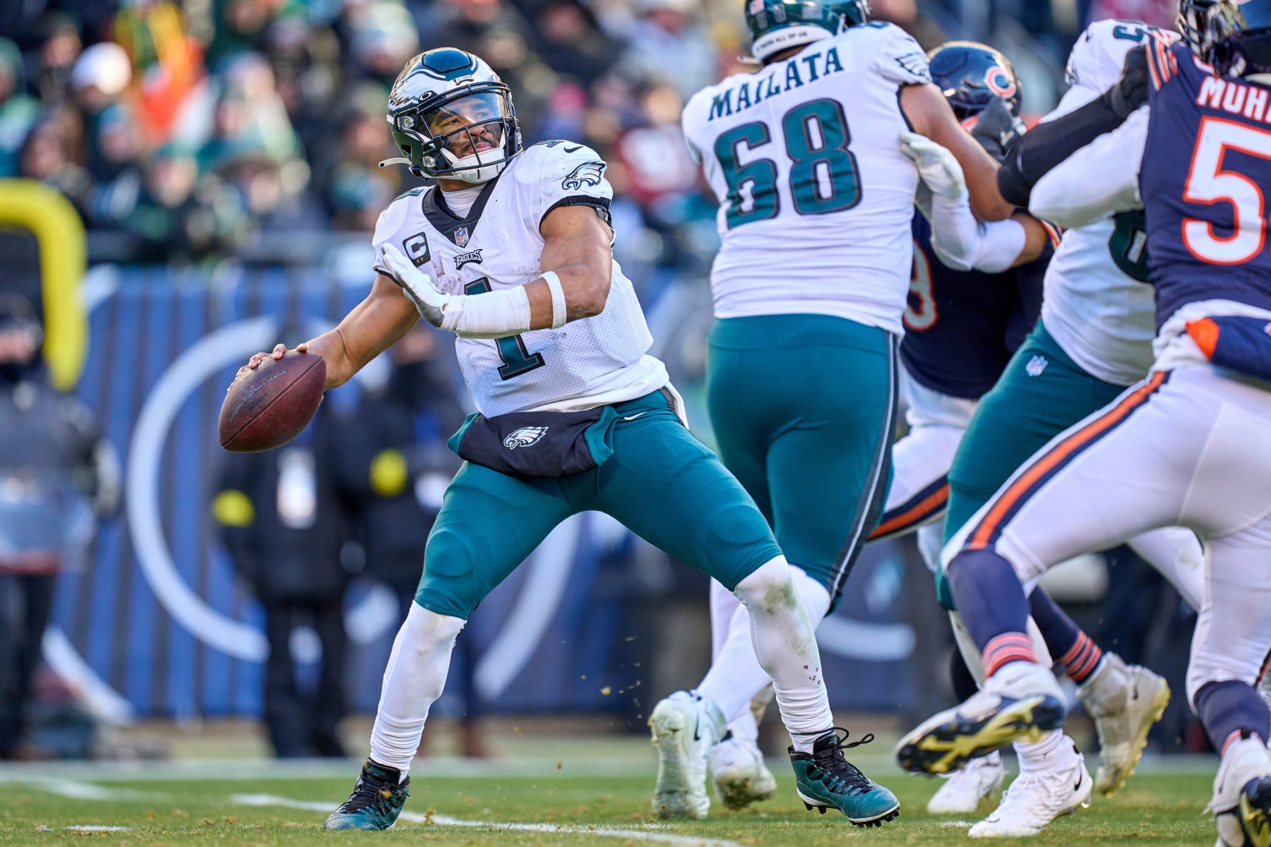CHICAGO, IL - DECEMBER 18: Philadelphia Eagles quarterback Jalen Hurts (1) throws the football in action during a game between the Philadelphia Eagles and the Chicago Bears on December 18, 2022, at Soldier Field in Chicago, IL. (Photo by Robin Alam/Icon Sportswire via Getty Images)