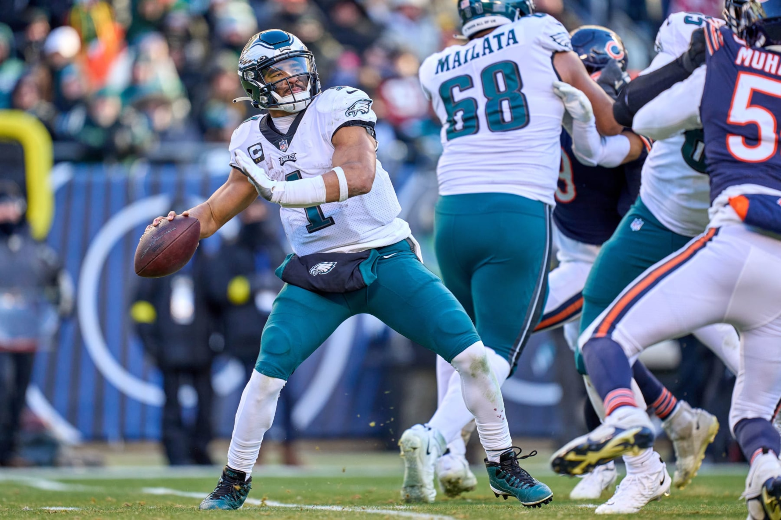 CHICAGO, IL - DECEMBER 18: Philadelphia Eagles quarterback Jalen Hurts (1) throws the football in action during a game between the Philadelphia Eagles and the Chicago Bears on December 18, 2022, at Soldier Field in Chicago, IL. (Photo by Robin Alam/Icon Sportswire via Getty Images)