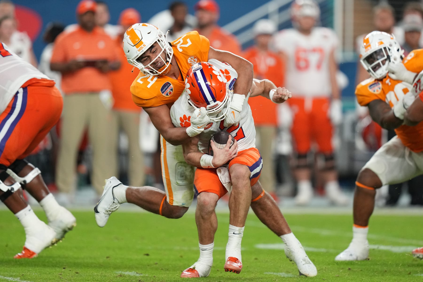 MIAMI GARDENS, FL - DECEMBER 30: Tennessee Volunteers linebacker Aaron Beasley (24) sacks Clemson Tigers quarterback Cade Klubnik (2) in the first half during the Capital One Orange Bowl game between the Tennessee Volunteers and the Clemson Tigers on Friday, December 20, 2022 at Hard Rock Stadium, Miami Gardens, Fla. (Photo by Peter Joneleit/Icon Sportswire via Getty Images)
