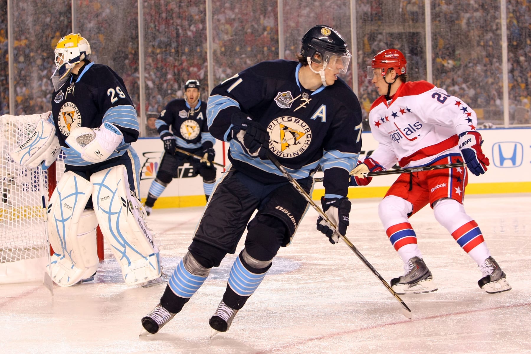 PITTSBURGH, PA - JANUARY 01:  Evgeni Malkin #71 of the Pittsburgh Penguins in action against the Washington Capitals during the 2011 NHL Bridgestone Winter Classic at Heinz Field on January 1, 2011 in Pittsburgh, Pennsylvania.  (Photo by Dave Sandford/NHLI via Getty Images)