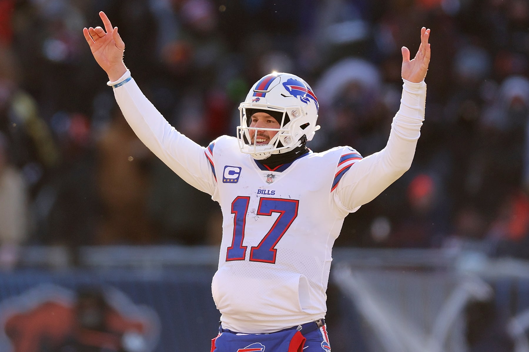 CHICAGO, ILLINOIS - DECEMBER 24: Josh Allen #17 of the Buffalo Bills celebrates a touchdown against the Chicago Bears during the third quarter at Soldier Field on December 24, 2022 in Chicago, Illinois. (Photo by Michael Reaves/Getty Images)