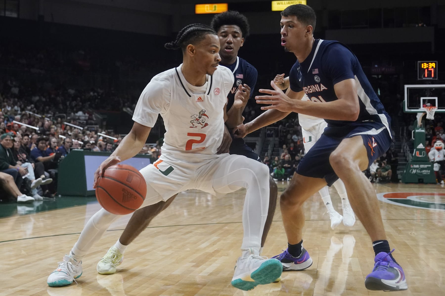 Miami's Isaiah Wong and Virginia's Kadin Shedrick