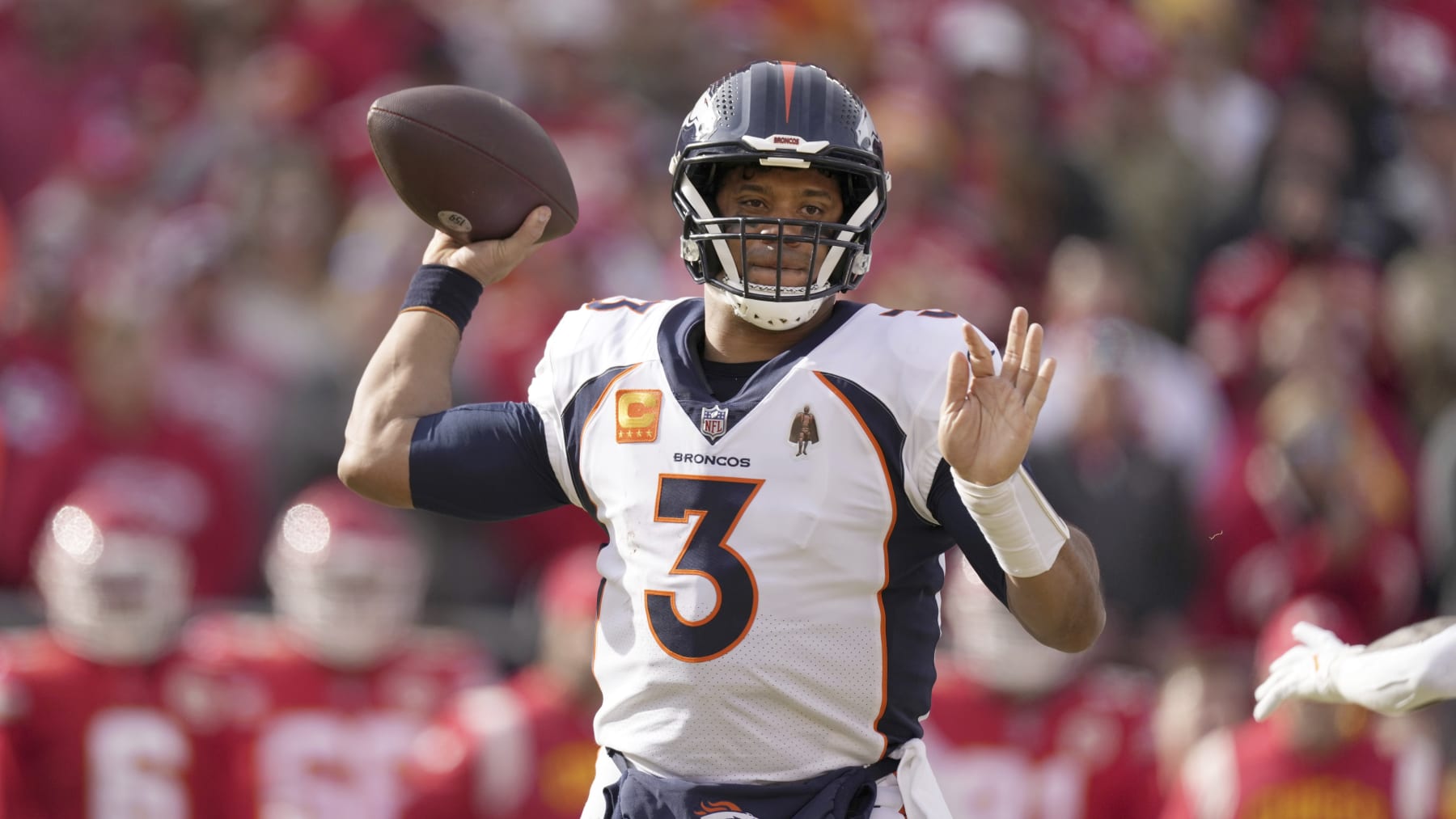 Denver Broncos quarterback Russell Wilson throws during the first half of an NFL football game against the Kansas City Chiefs Sunday, Jan. 1, 2023, in Kansas City, Mo. (AP Photo/Charlie Riedel)