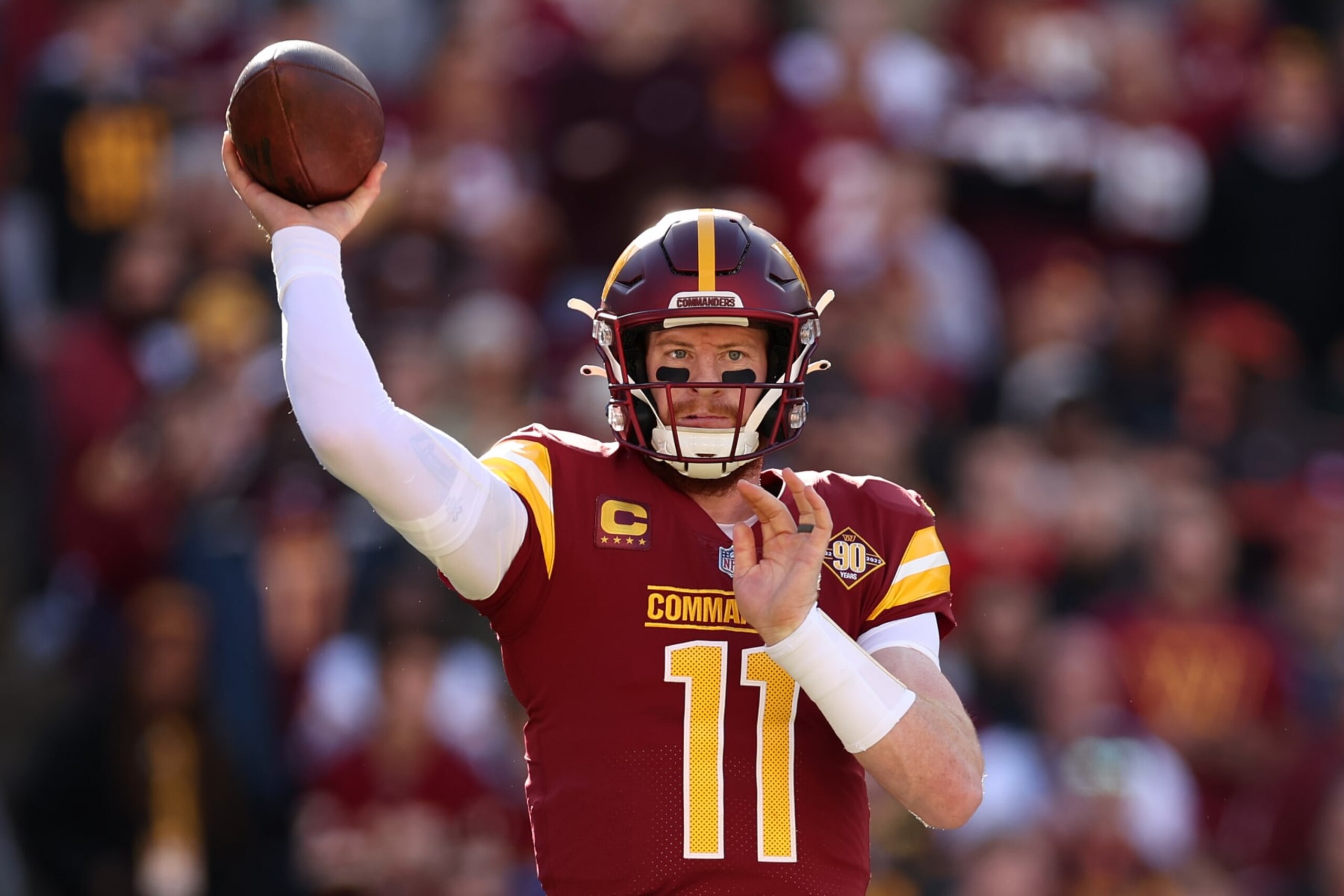 LANDOVER, MARYLAND - JANUARY 01: Carson Wentz #11 of the Washington Commanders throws a pass during the first quarter against the Cleveland Browns at FedExField on January 01, 2023 in Landover, Maryland. (Photo by Scott Taetsch/Getty Images)