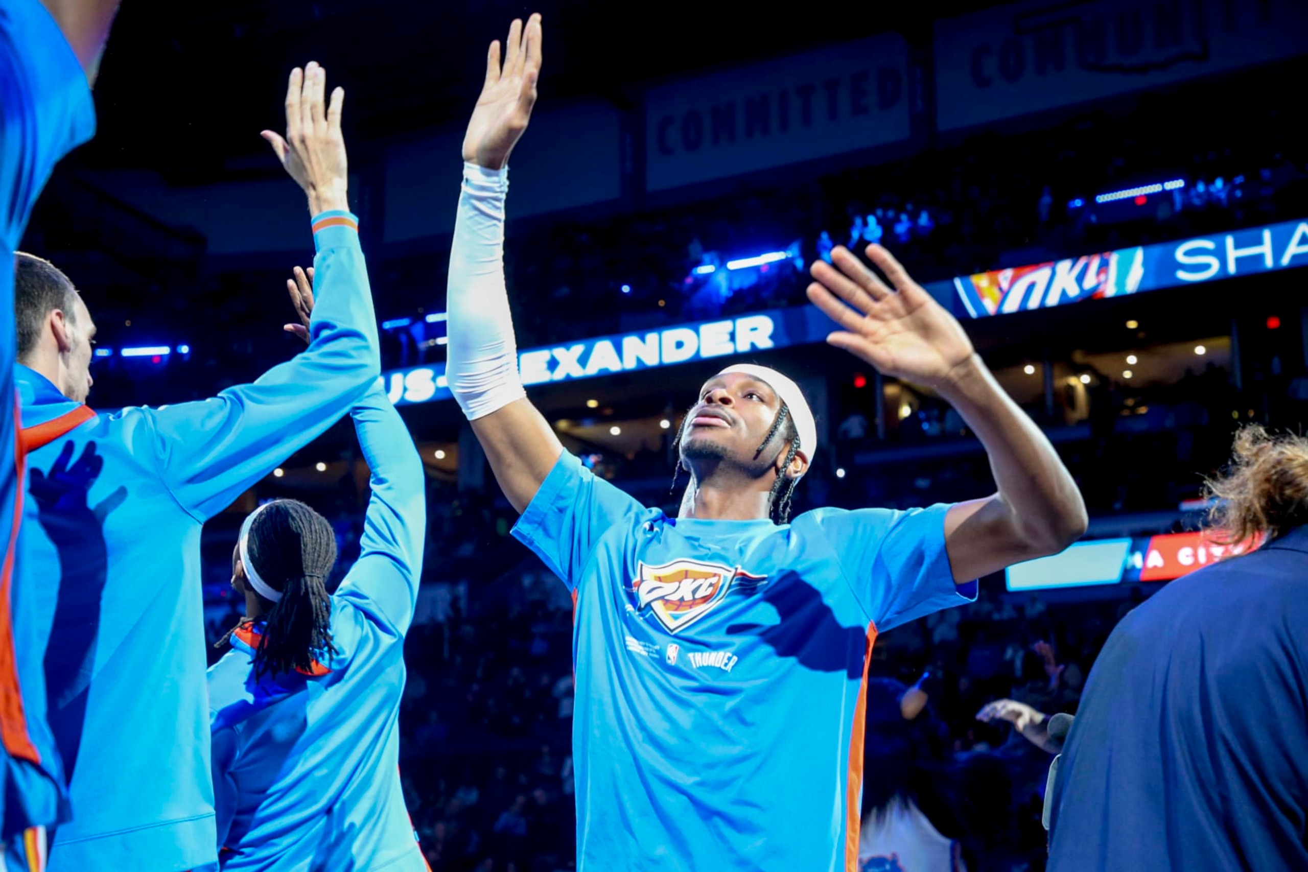 OKLAHOMA CITY, OKLAHOMA - DECEMBER 19: Shai Gilgeous-Alexander #2 of the Oklahoma City Thunder high fives teammates during pregame against the Portland Trail Blazers at Paycom Center on December 19, 2022 in Oklahoma City, Oklahoma. NOTE TO USER: User expressly acknowledges and agrees that, by downloading and or using this photograph, User is consenting to the terms and conditions of the Getty Images License Agreement.  (Photo by Ian Maule/Getty Images)