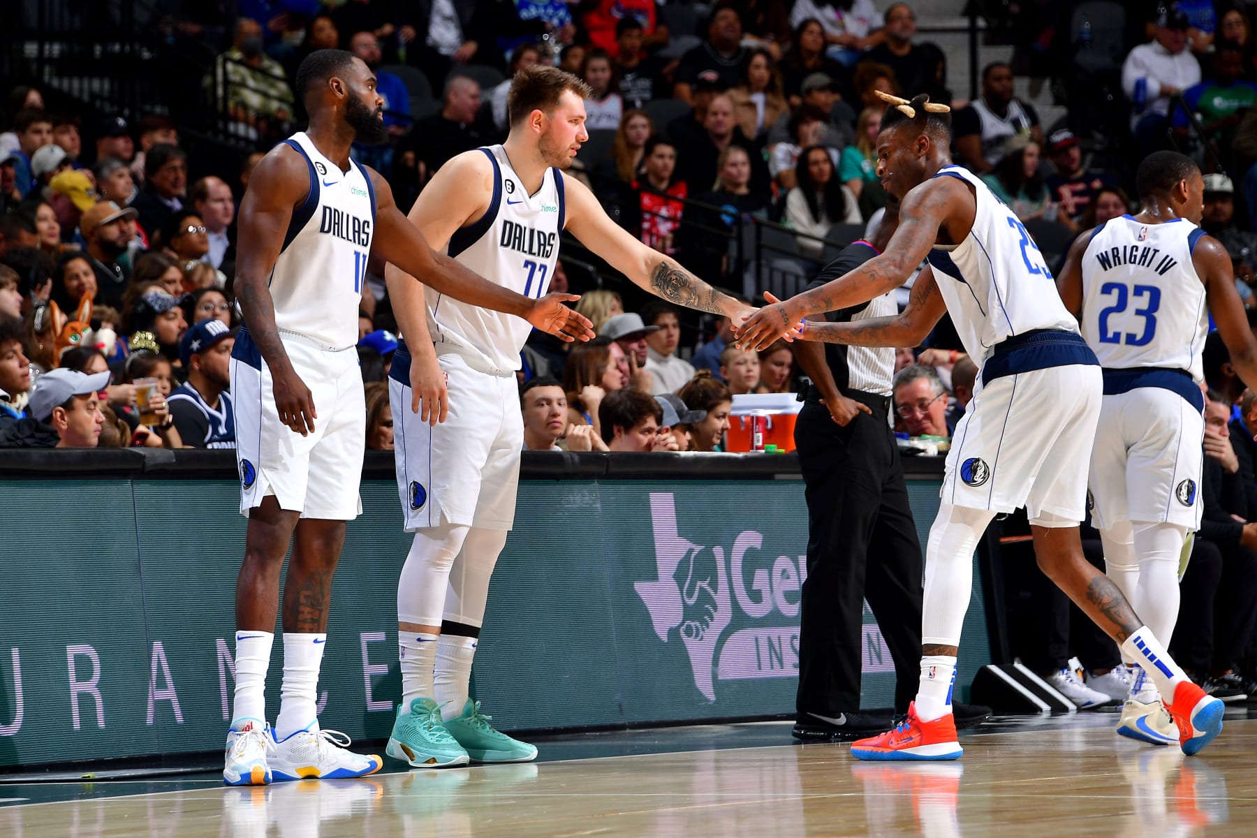 Tim Hardaway Jr., Luka DonÄiÄ, Reggie Bullock and McKinley Wright IV