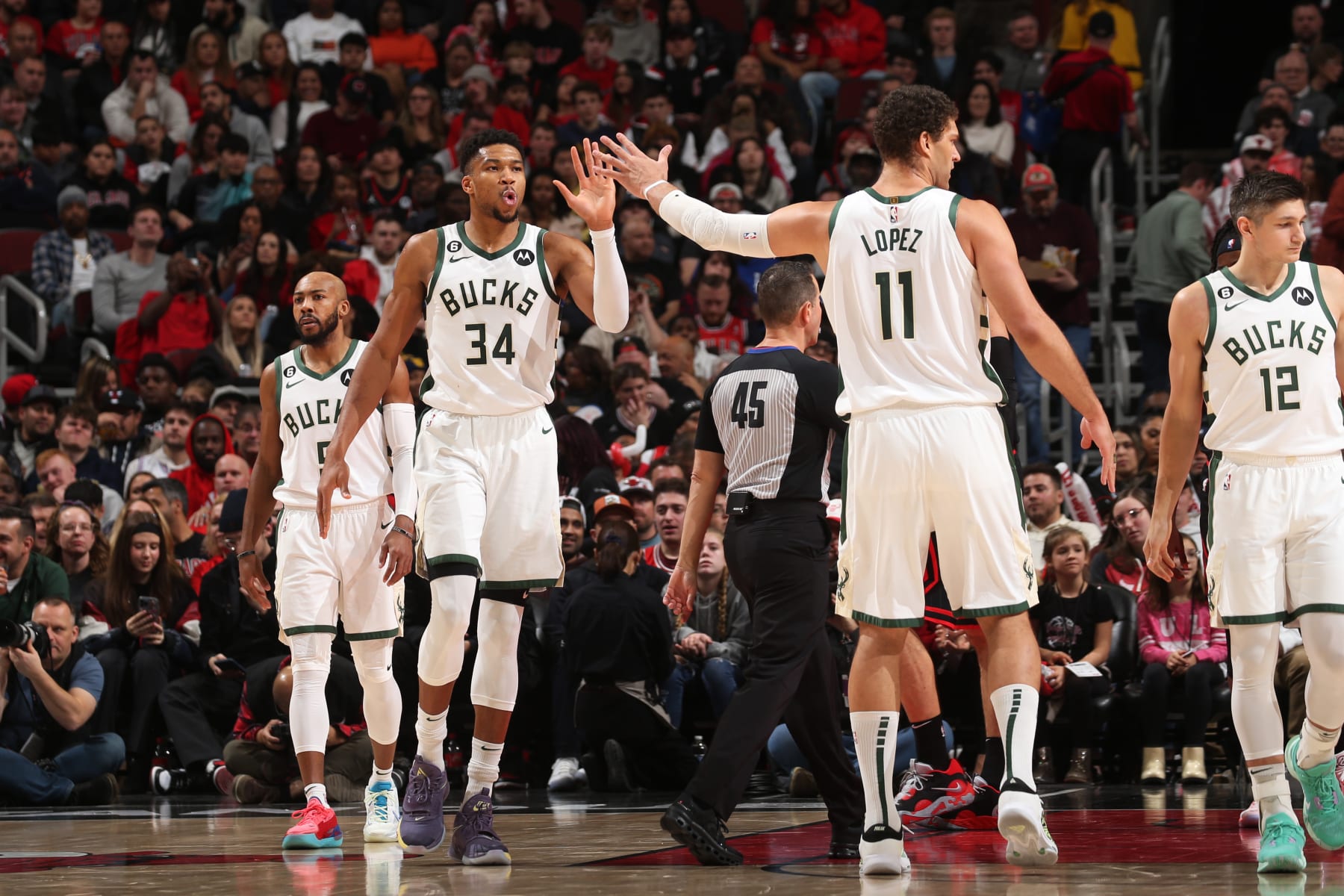 Jevon Carter, Giannis Antetokounmpo, Brook Lopez and Grayson Allen