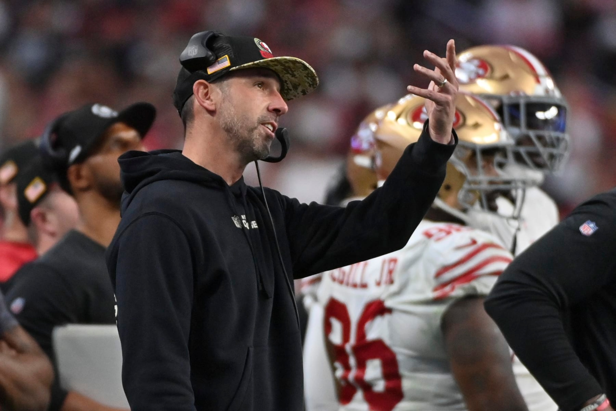 San Francisco 49ers head coach Kyle Shanahan watches a replay during the first half of an NFL football game between the San Francisco 49ers and Las Vegas Raiders, Sunday, Jan. 1, 2023, in Las Vegas. (AP Photo/David Becker)