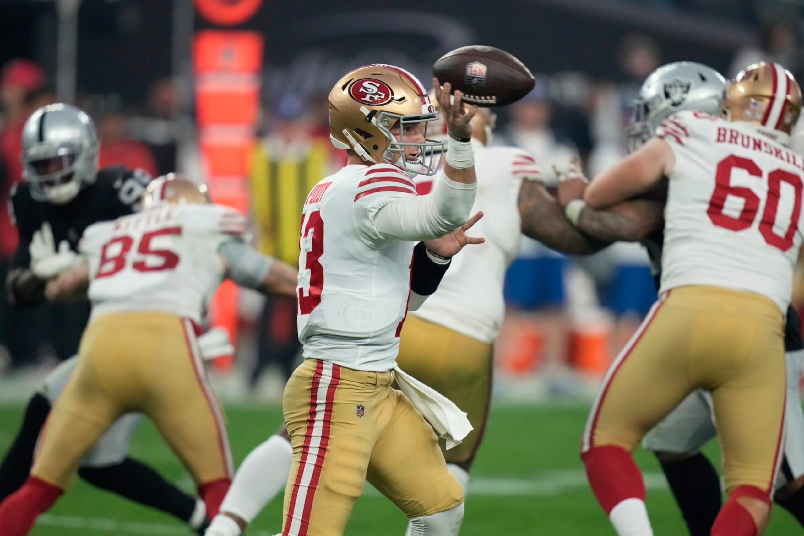San Francisco 49ers quarterback Brock Purdy (13) throws a pass during the second half of an NFL football game between the San Francisco 49ers and Las Vegas Raiders, Sunday, Jan. 1, 2023, in Las Vegas. (AP Photo/John Locher)