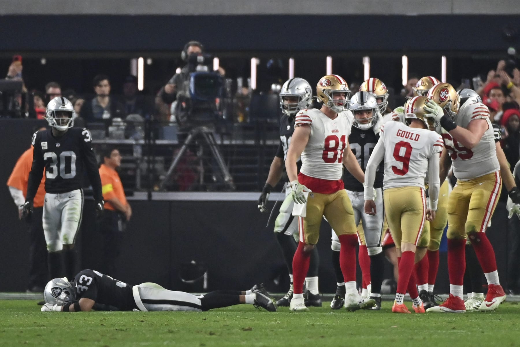 San Francisco 49ers place kicker Robbie Gould (9) is congratulated after kicking a 23-yard field gaol to defeat the Raiders in an NFL football game between the San Francisco 49ers and Las Vegas Raiders, Sunday, Jan. 1, 2023, in Las Vegas. The 49ers defeated the Raiders 37-34 in overtime. (AP Photo/David Becker)