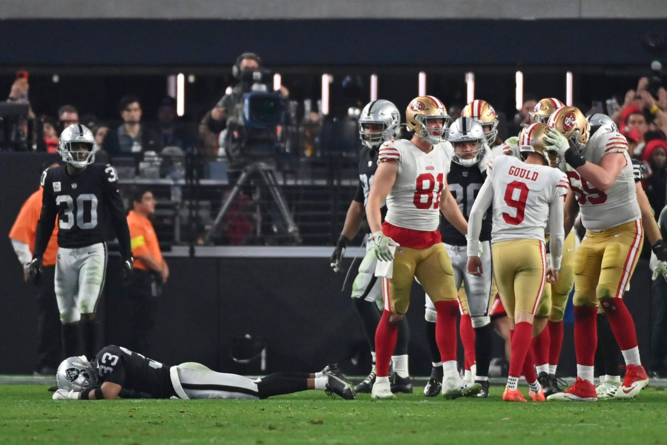San Francisco 49ers place kicker Robbie Gould (9) is congratulated after kicking a 23-yard field gaol to defeat the Raiders in an NFL football game between the San Francisco 49ers and Las Vegas Raiders, Sunday, Jan. 1, 2023, in Las Vegas. The 49ers defeated the Raiders 37-34 in overtime. (AP Photo/David Becker)