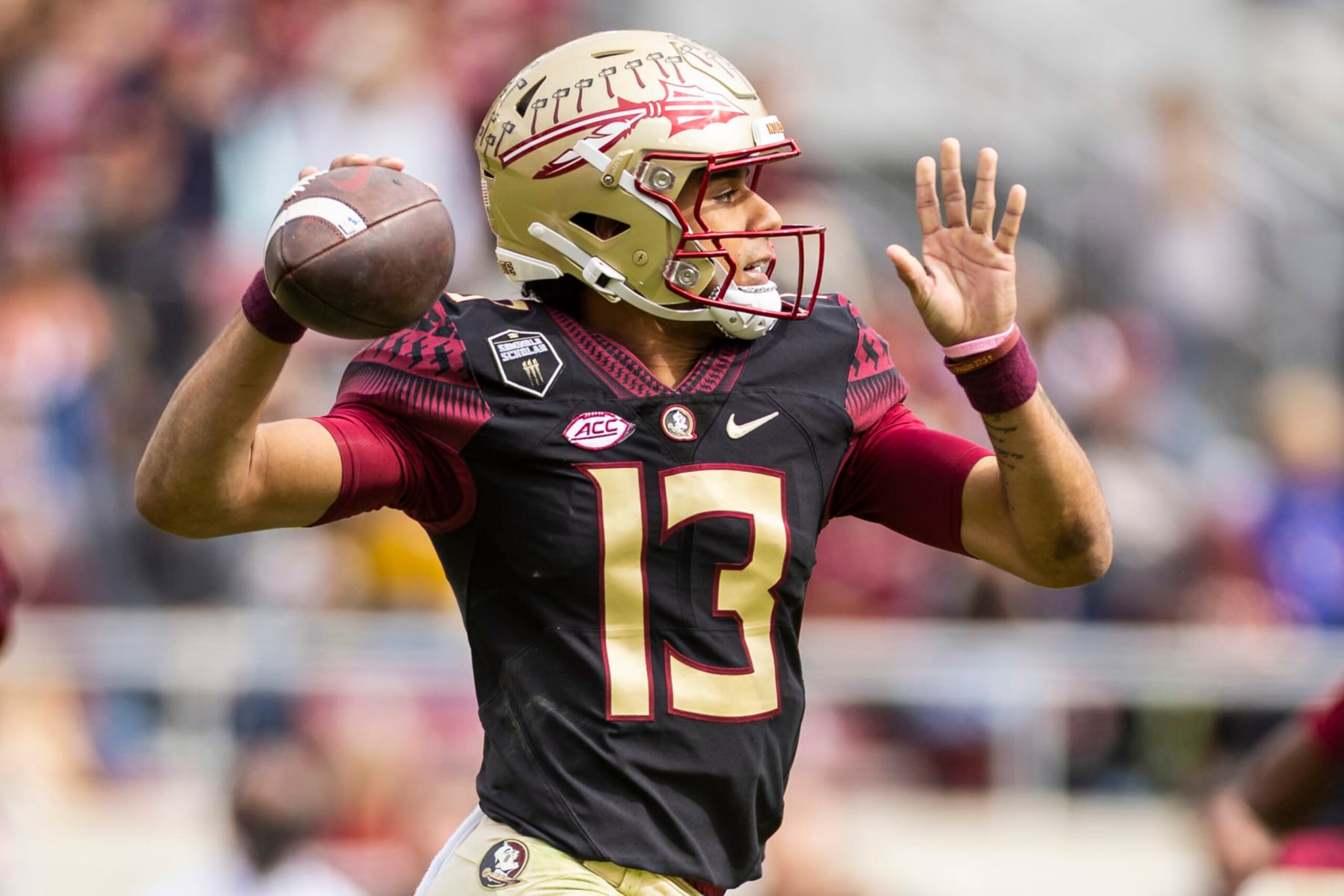 TALLAHASSEE, FLORIDA - NOVEMBER 19: Jordan Travis #13 of the Florida State Seminoles throws a pass during the first half of a game against the Louisiana-Lafayette Ragin Cajuns at Doak Campbell Stadium on November 19, 2022 in Tallahassee, Florida. (Photo by James Gilbert/Getty Images) TALLAHASSEE, FLORIDA - NOVEMBER 19: Jordan Travis #13 of the Florida State Seminoles throws a pass during the first half of a game against the Louisiana-Lafayette Ragin Cajuns at Doak Campbell Stadium on November 19, 2022 in Tallahassee, Florida. (Photo by James Gilbert/Getty Images)