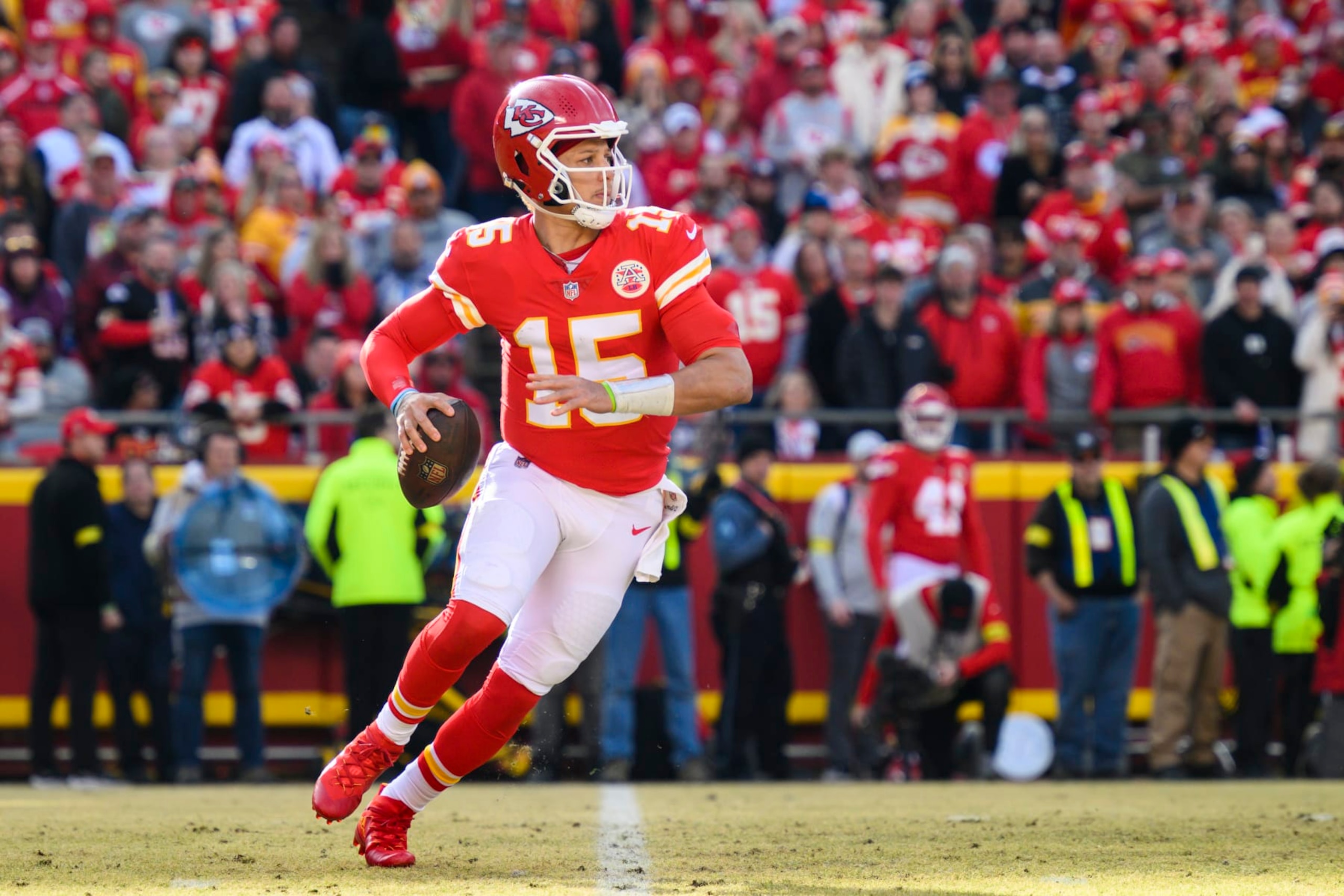 Kansas City Chiefs quarterback Patrick Mahomes rolls out to pass against the Denver Broncos during the second half of an NFL football game, Sunday, Jan. 1, 2023 in Kansas City, Mo. (AP Photo/Reed Hoffmann) Kansas City Chiefs quarterback Patrick Mahomes rolls out to pass against the Denver Broncos during the second half of an NFL football game, Sunday, Jan. 1, 2023 in Kansas City, Mo. (AP Photo/Reed Hoffmann)