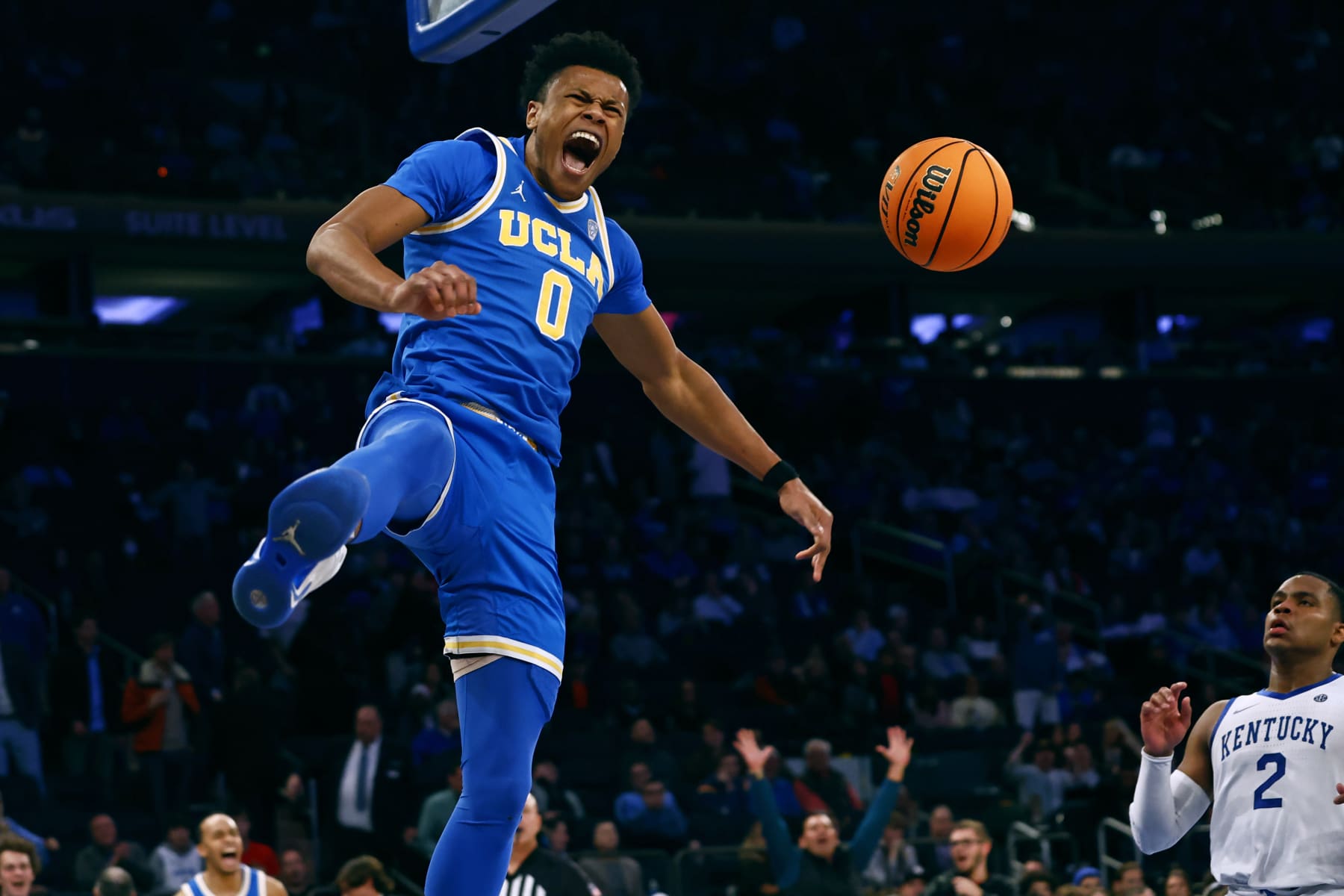 NEW YORK, NY - DECEMBER 17: Jaylen Clark #0 of the UCLA Bruins reacts after he dunks against the Kentucky Wildcats during the second half of a game in the CBS Sports Classic at Madison Square Garden on December 17, 2022 in New York City. UCLA defeated Kentucky 63-53. (Photo by Rich Schultz/Getty Images)