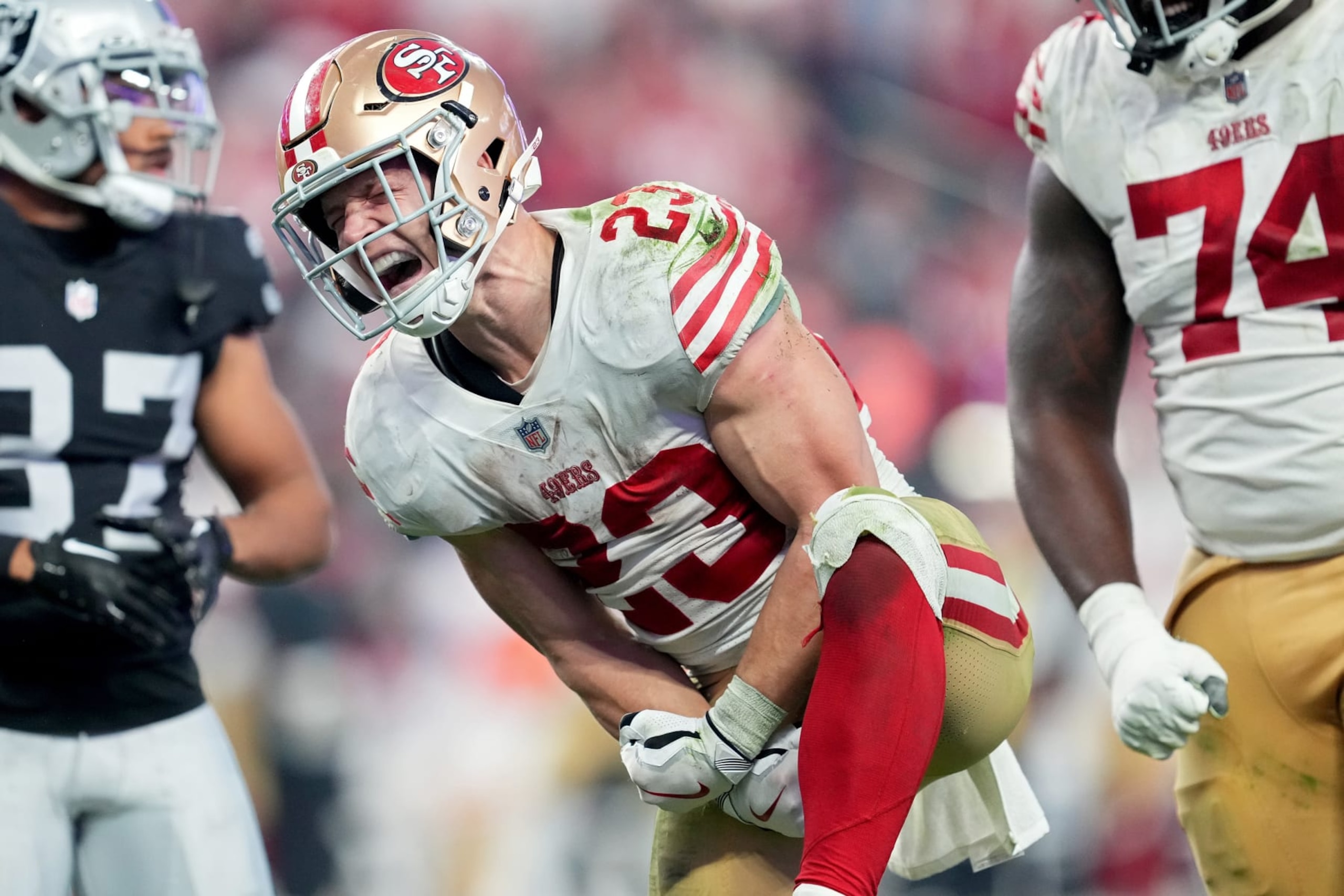 LAS VEGAS, NEVADA - JANUARY 01: Christian McCaffrey #23 of the San Francisco 49ers reacts after a run against the Las Vegas Raiders during the fourth quarter at Allegiant Stadium on January 01, 2023 in Las Vegas, Nevada. (Photo by Chris Unger/Getty Images)