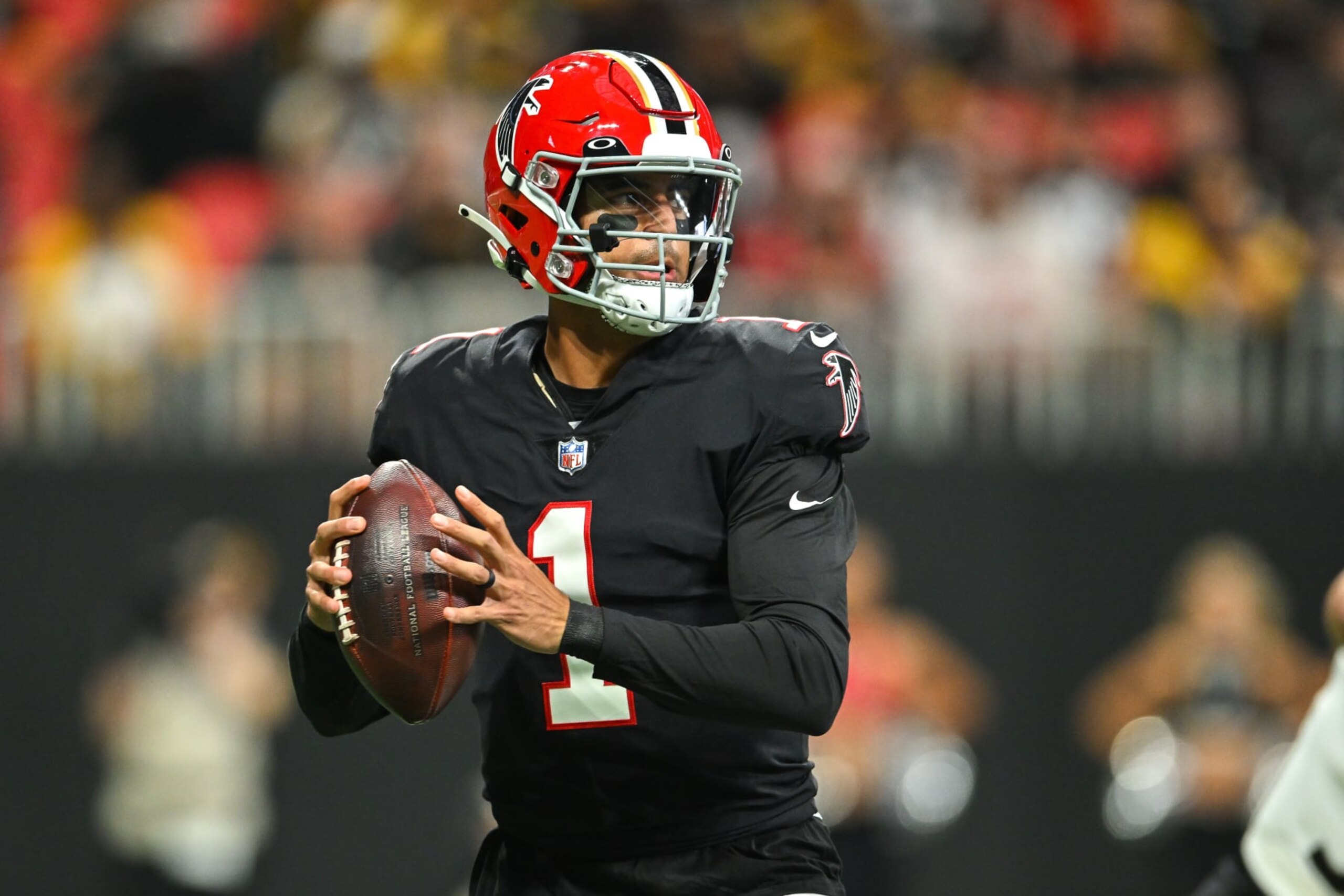 ATLANTA, GA  DECEMBER 04:  Atlanta quarterback Marcus Mariota (1) drops back to pass during the NFL game between the Pittsburgh Steelers and the Atlanta Falcons on December 4th, 2022 at Mercedes-Benz Stadium in Atlanta, GA.  (Photo by Rich von Biberstein/Icon Sportswire via Getty Images)