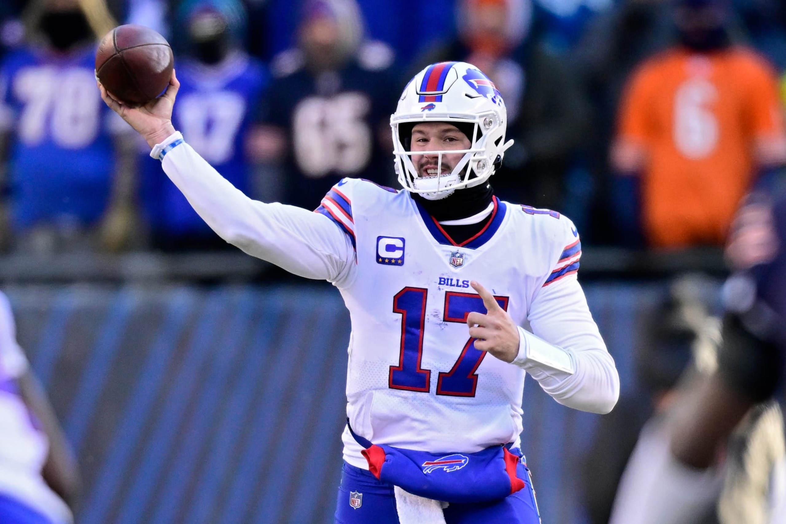 CHICAGO, ILLINOIS - DECEMBER 24: Josh Allen #17 of the Buffalo Bills throws a pass during the second half in the game against the Chicago Bears at Soldier Field on December 24, 2022 in Chicago, Illinois. (Photo by Quinn Harris/Getty Images)