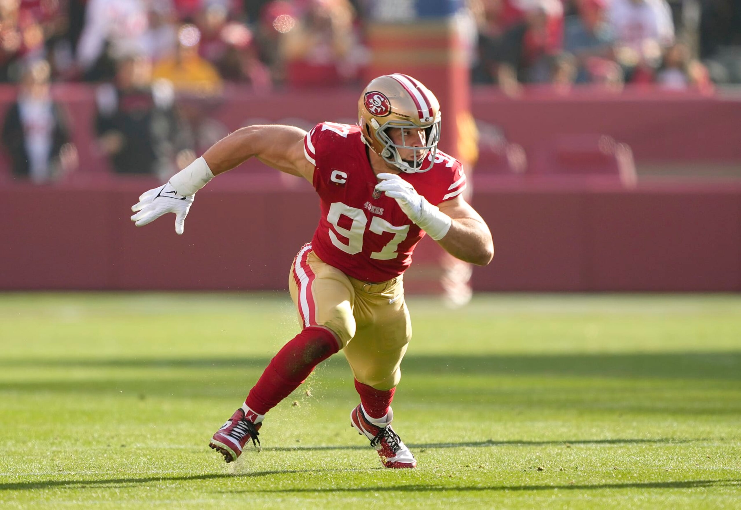 SANTA CLARA, CALIFORNIA - DECEMBER 24: Nick Bosa #97 of the San Francisco 49ers rushes to pursue the quarter against the Washington Commanders during the second quarter of an NFL football game at Levi's Stadium on December 24, 2022 in Santa Clara, California. (Photo by Thearon W. Henderson/Getty Images) SANTA CLARA, CALIFORNIA - DECEMBER 24: Nick Bosa #97 of the San Francisco 49ers rushes to pursue the quarter against the Washington Commanders during the second quarter of an NFL football game at Levi's Stadium on December 24, 2022 in Santa Clara, California. (Photo by Thearon W. Henderson/Getty Images)