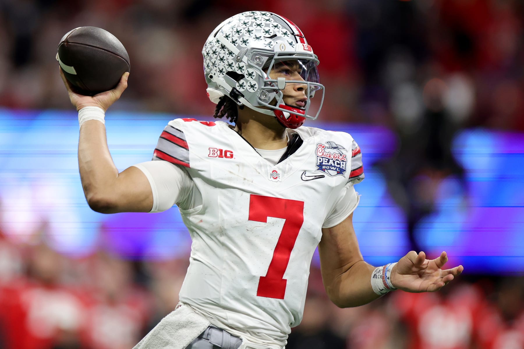 ATLANTA, GEORGIA - DECEMBER 31: C.J. Stroud #7 of the Ohio State Buckeyes throws a pass during the third quarter against the Georgia Bulldogs in the Chick-fil-A Peach Bowl at Mercedes-Benz Stadium on December 31, 2022 in Atlanta, Georgia. (Photo by Carmen Mandato/Getty Images)