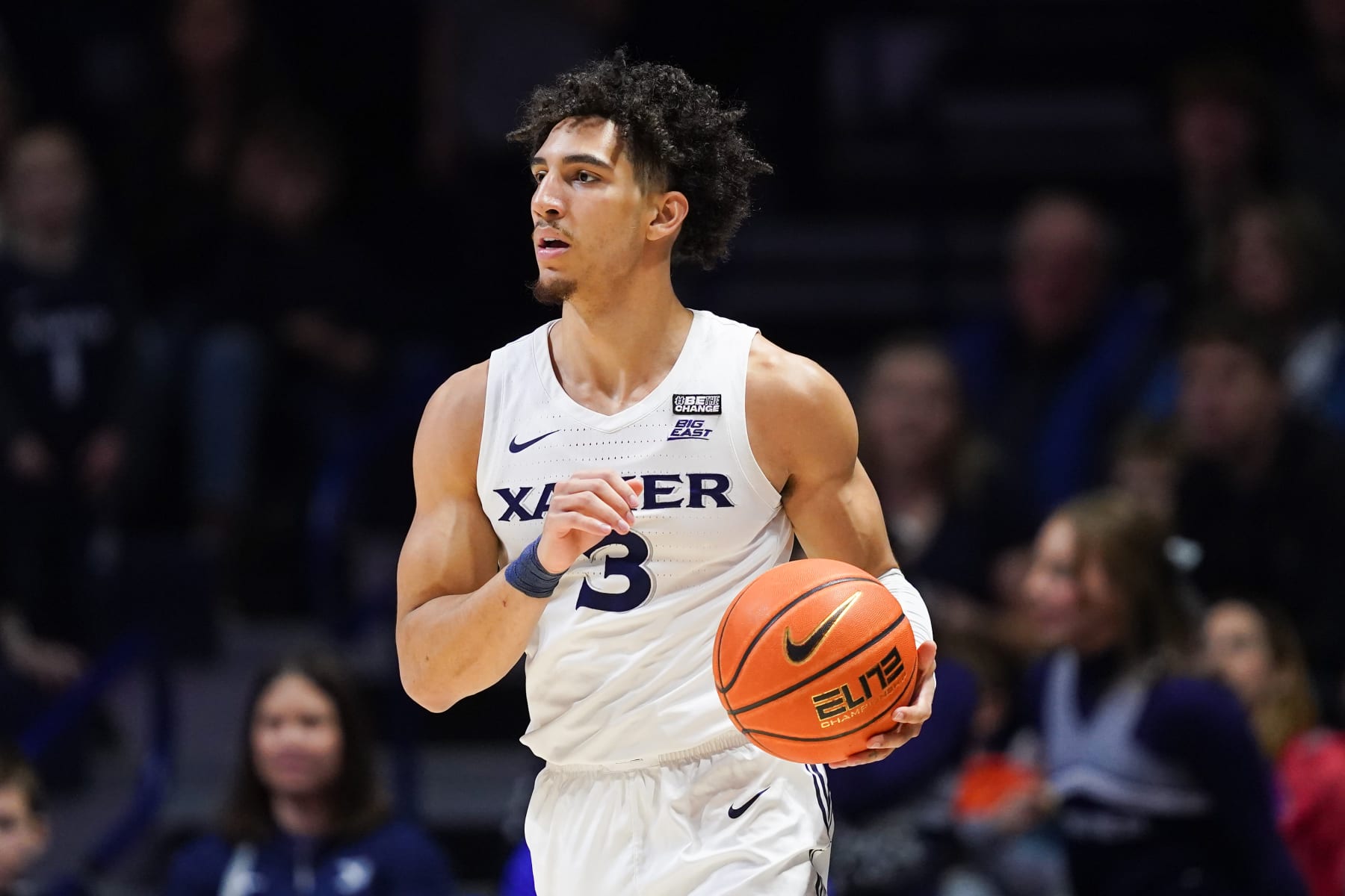 CINCINNATI, OHIO - DECEMBER 31: Colby Jones #3 of the Xavier Musketeers dribbles the ball in the first half against the Connecticut Huskies at the Cintas Center on December 31, 2022 in Cincinnati, Ohio. (Photo by Dylan Buell/Getty Images)