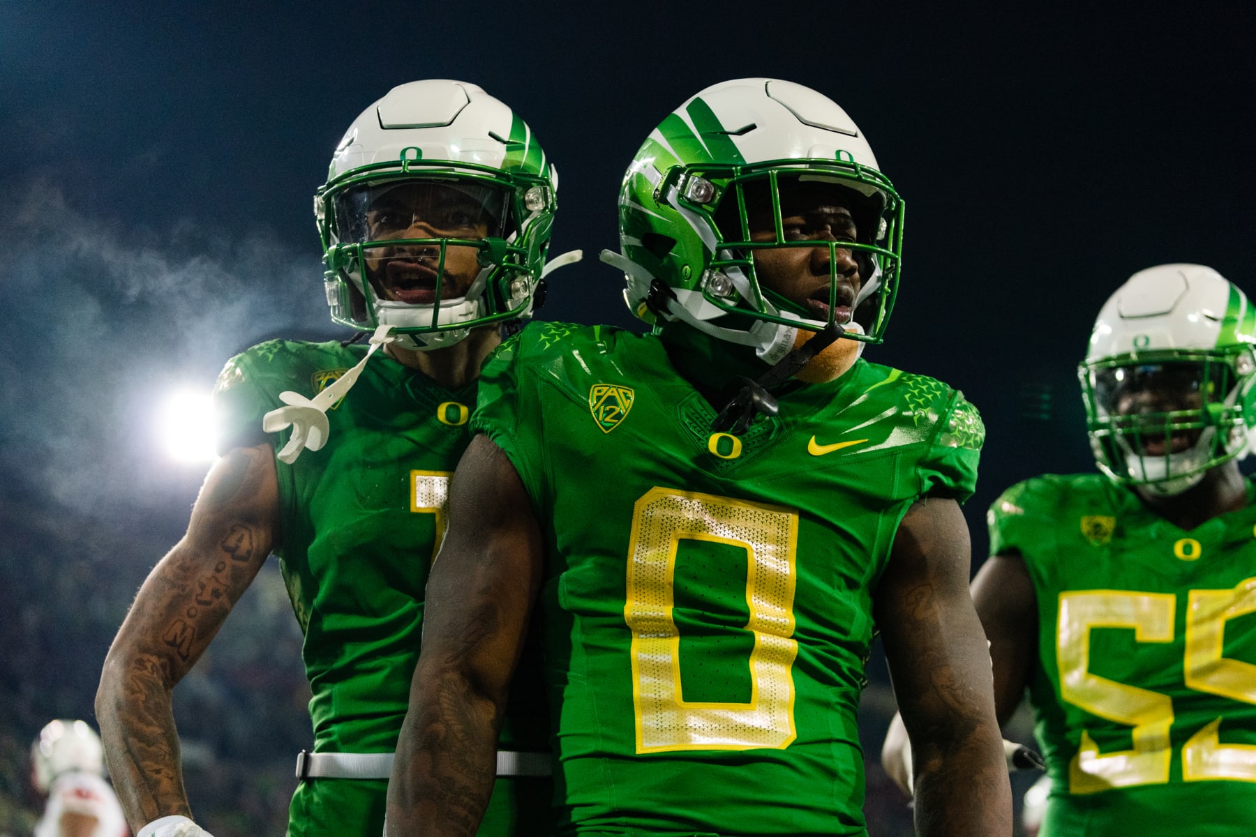 EUGENE, OR - NOVEMBER 19:  Running back Bucky Irving #0 of the Oregon Ducks celebrates after his touchdown during the first quarter of the game against the Utah Utes at Autzen Stadium on November 19, 2022 in Eugene, Oregon. (Photo by Ali Gradischer/Getty Images)