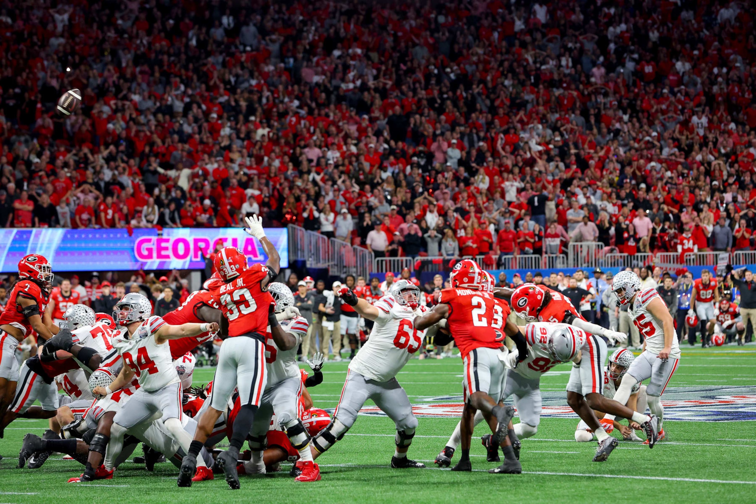 ATLANTA, GEORGIA - DECEMBER 31: Noah Ruggles #95 of the Ohio State Buckeyes misses a field goal in the final seconds of the game against the Georgia Bulldogs in the Chick-fil-A Peach Bowl at Mercedes-Benz Stadium on December 31, 2022 in Atlanta, Georgia. (Photo by Kevin C. Cox/Getty Images)